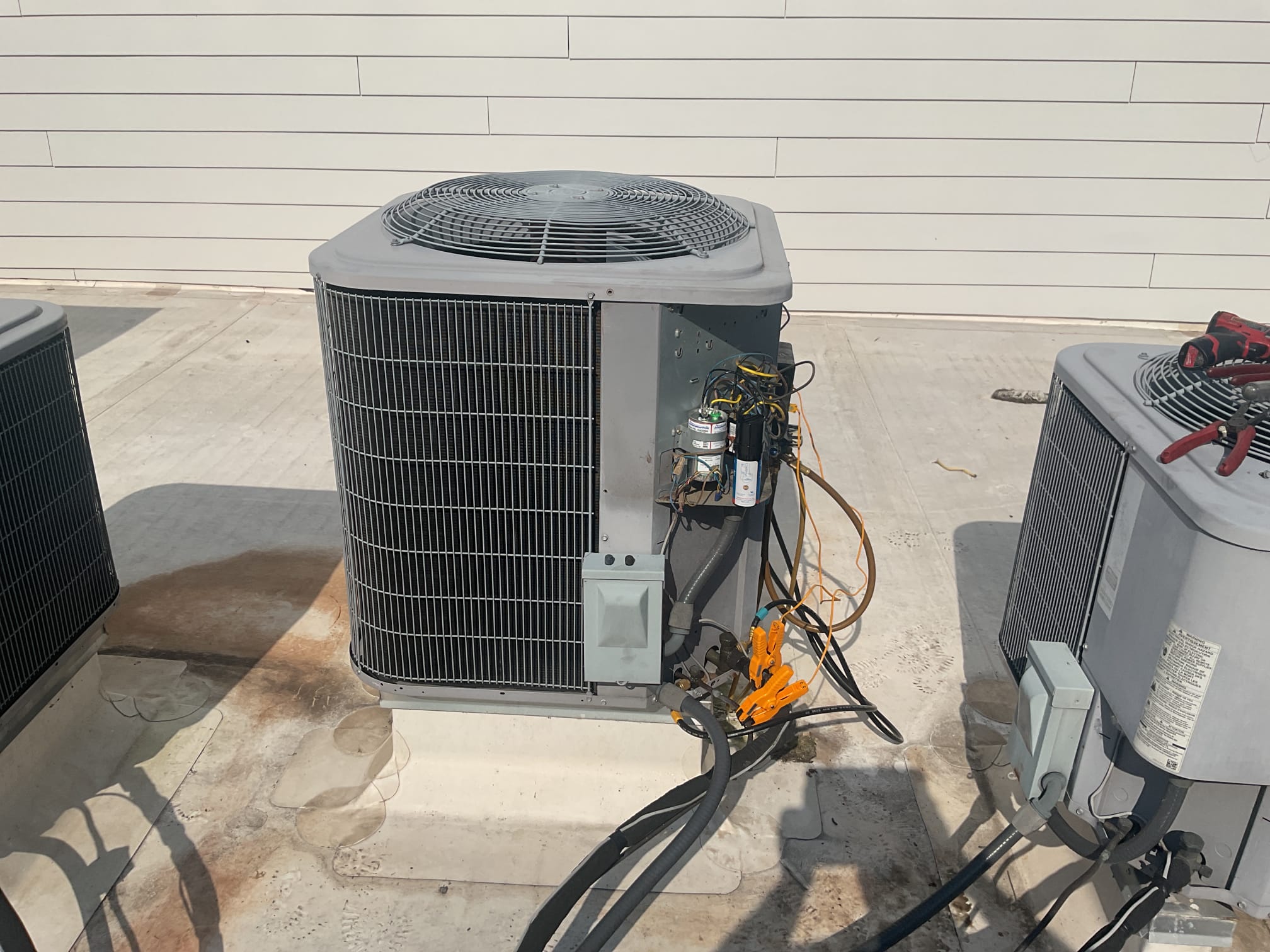 7/1/26. Fully assessed no cooling situation on 2016 carrier split a/c system. Found burnt up hard start kit, capacitor, and double pole contactor. Also found hole burnt thru electric panel cover on unit. Wayne wanted to replace burnt up parts to see if compressor was ok. Checked compressor with megometer it passed. Replaced all parts an cut off burnt up wires. Everything was supplied by riverworks except double pole contactor. Tested a/c operation. Compressor amps were 10 amps which were good. Checked r410a refrigerant pressures they were 359/125 16 subcooling and 12 superheat. 13 subcooling is what it calls for so not bad. A/c is working properly at time of service. 