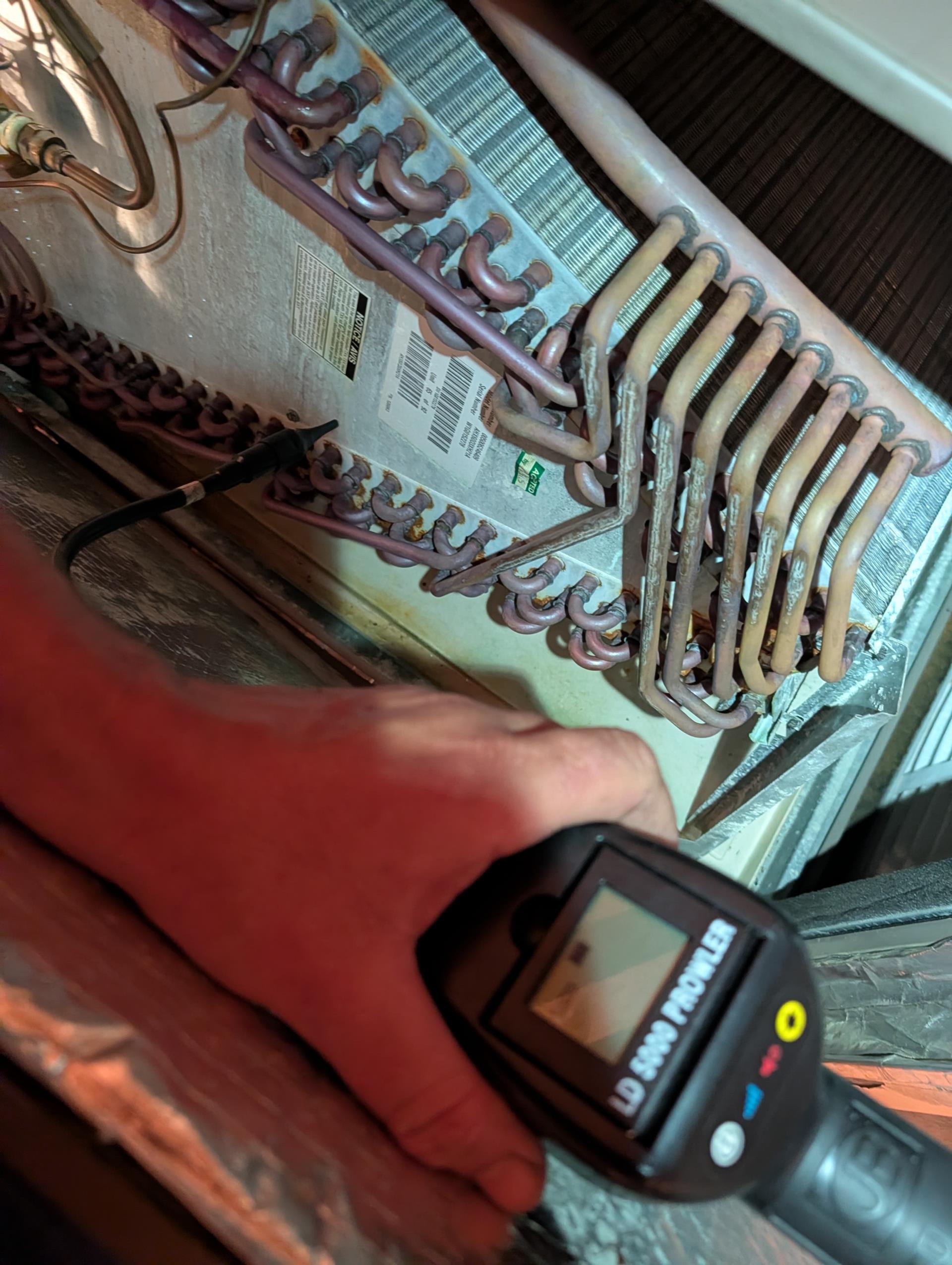 No cooling issue with the educational wing system.
Thermostat is in the prayer meeting room further out room on left hand side of hallway. 
Found refrigerant pressures to be low 88 psi suction pressure. Subcooling very low as well (less than 1 degree)
Checked indoor equipment. Replaced 20x25x1 filter. 
Conducted Complimentary electronic leak leak search. Could not pinpoint a leak. The sticker on the metal A-plate indicates the indoor coil dates to 2010. Outdoor 5 Ton unit dates to 2022. 

Offered to charge the system to get it to design performance for now as they need the system to keep this part of building comfortable in upcoming weeks. 
Charged system r410A to design subcooling and superheat.

Frank and Anil will call us regarding updating/replacing this system after vacation bible school ends. 