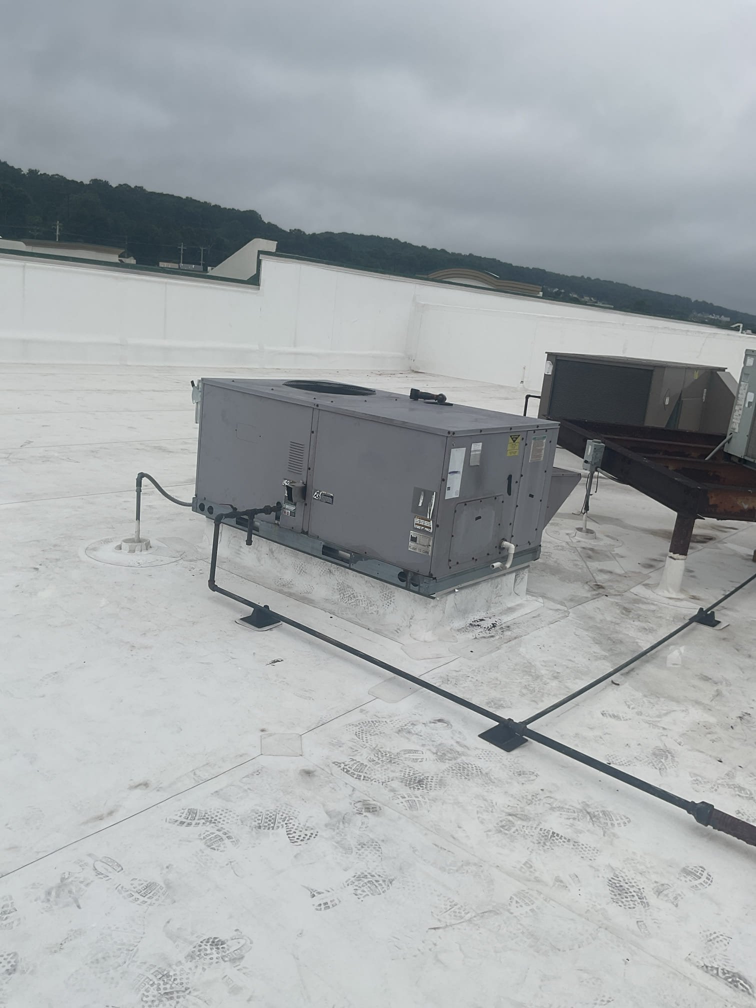 Luis 7-6-26
Customer called in for no cooling carrier rooftop unit found system running but thermostat set to cool. There are total of 3 units that cool and heat the dining area. Right side but units are working, Left side side of restaurant has trane (currently not working) and carrier unit that is also not Collings at this time. Test system operation and found dirty filters. Customer approved replacement of filters. Test system operation check refrigerant levels. System is cooling at maximum point. I noticed big holes on front of the heat exchanger. I turned off gas to carrier unit. I would recommend system replacement for carrier and trane unit. I talked to Joe while on site he will provide estimate for replacement. 
Replacement of filters 