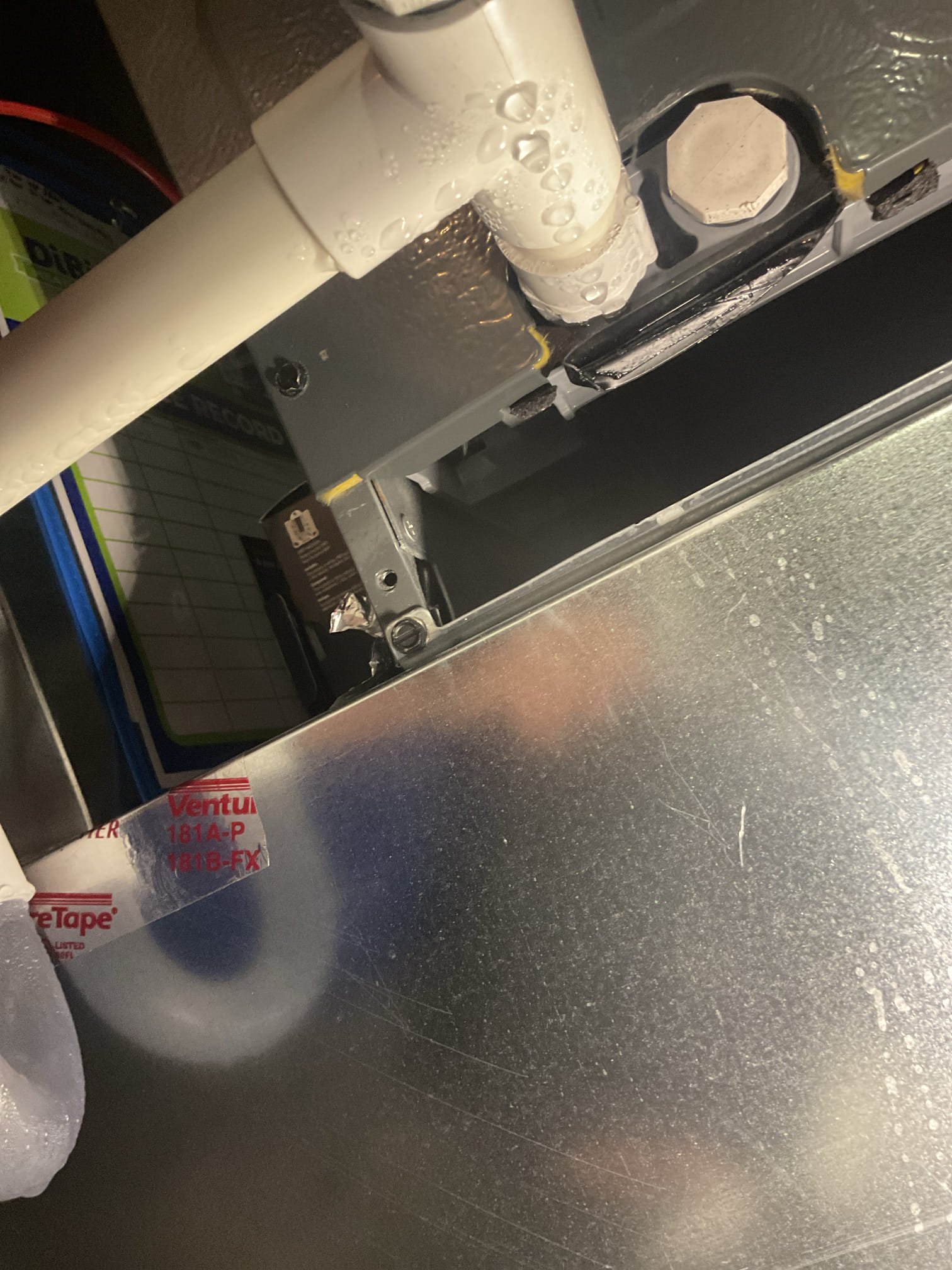 7/7/26. Fully assessed water leaking situation from Goodman heat pump system installed by dibiase 1/26. Found dirty air filter from install 20x20x1. Homeowner to replace. Also found all pipping sweating. Recommend putting a dehumidifier in the basement. After further investigation. Found water dripping off the coil from inside the A coil before it makes it into the drain pan ever once in a while, this was causing the water in 5he drain pan. Thermostat was also set to 68 degrees, recommend setting it to 70 degrees for a slightly warmer return temp. There can be cutting oil on the coil from when it was made in the factory can also cause the water droplets to do this. Checked r-32 refrigerant pressures they were 268/113 with 12 subcooling. A/c is working properly at time of service. Told homeowner to keep an eye on it and let us know. Also sprayed some coil cleaner on evaporator coil to try to remove some of the cutting oil. 
