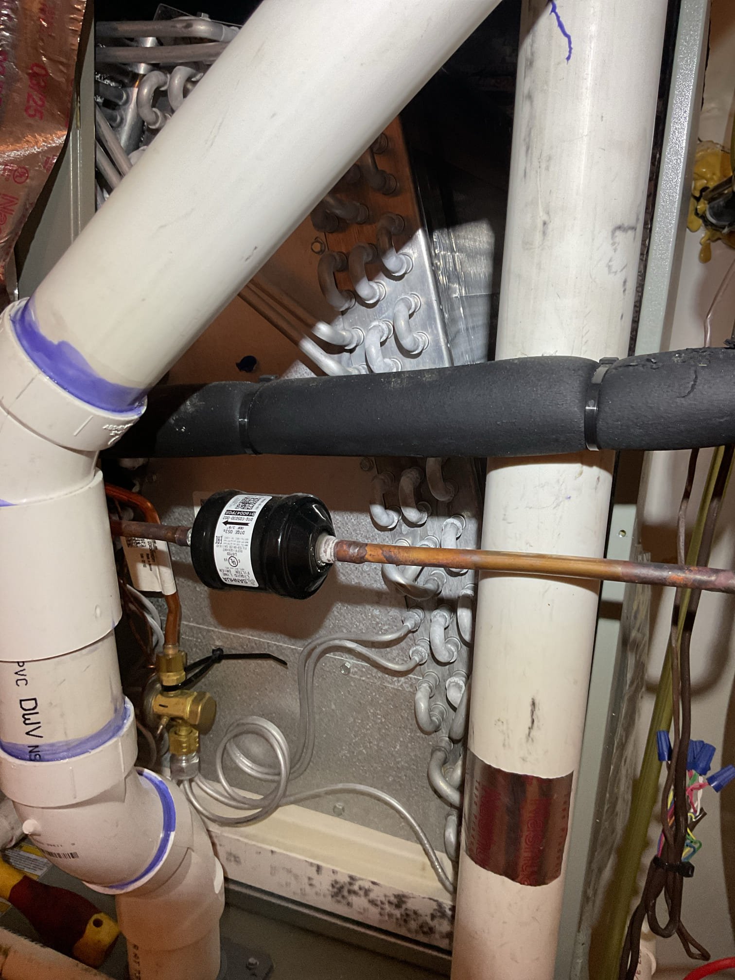 Completed AC tune up for 4 Ton Trane AC system
System was installed 6/7;23 by another contractor 

20x25x1 filter
Indoor and outdoor coils in good condition 
Inspected wiring, controls, electric motors and components; left estimates for surge protectors 
Measured temperature split (15°) target is 18-20°and static pressure (1.2”)
Inspected drains; cleared EZ trap, tested pump; pump is outside drain pan. Provided email estimate for WiFi water sensor that will shut equipment down if water is detected on floors around equipment
 
Checked integrity of compressor motor (mega ohm test)

Assessed refrigerant charge checked pressures. System is under charged.
Running at 34° SH 1.2° Subcooling. Target subcooling is 10°. Suction line is warm to the touch and not condensing at all. 
*Indoor Fan speed tap is tap 7 which will allow for 1600 CFM at measured static pressure

It is undercharged either because when it was first installed the refrigerant that is necessary was never added and/or because t