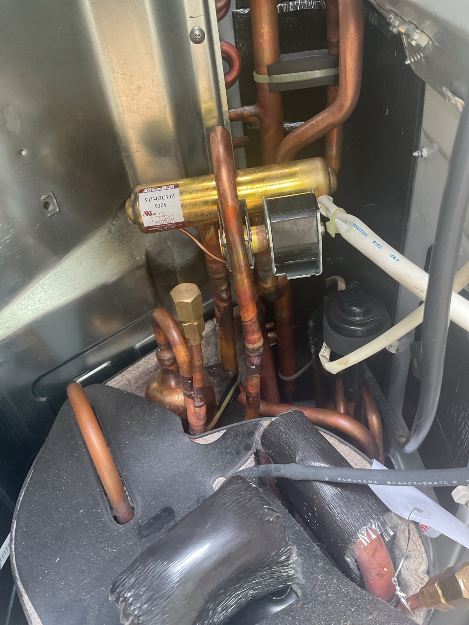 7/14/26. Recovered all refrigerant from mini split heat pump system. Un brazed old reversing valve while purging with nitrogen. Brazen in new reversing valve and pressure tested with 250 psi nitrogen and soap checked. Re installed Exsisting reversing valve coil. Vacuumed down system to 500 microns. Added in factory charge of 3 lbs 9ozs of 410a. Suction pressure stayed between 110-115 psi. Had a 20 degrees split at cassette head. A/c is working properly at time of service. 