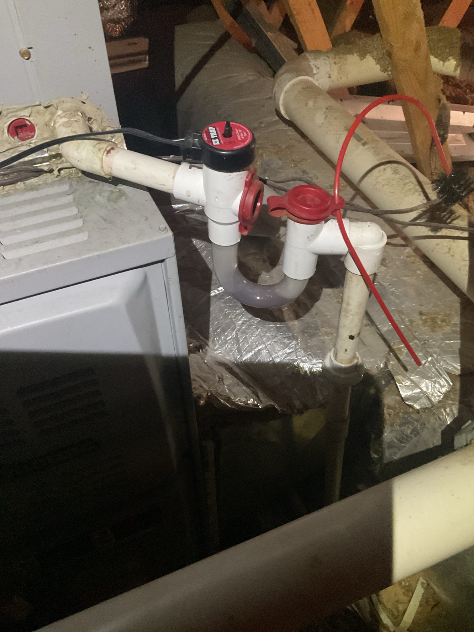I arrived to the customers home for their second floor system not working. The thermostat is blank. It keeps going on and off. I went up into the attic and found easy trap was clogged. I cleared out with a brush and ran water through the main coil pan and threw the easy trap made sure everything was draining properly. The system is back up and running at this time of service systems are older. I do recommend replacement in the near future. I did leave some water safety estimates for the first floor, the only  water safety in the basement is the condensate pump . No charge recall from maintenance. 