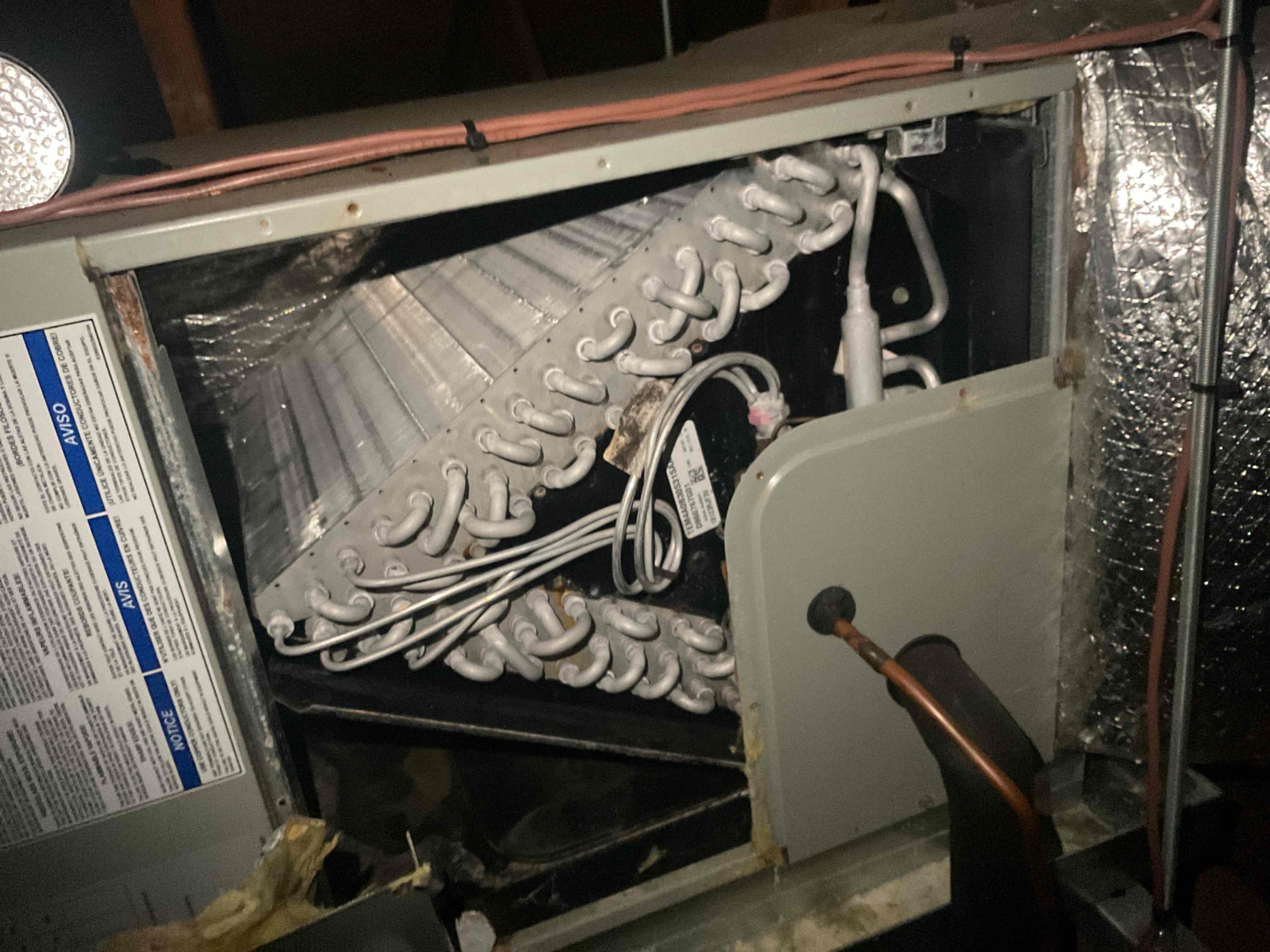 7/20/26. Fully assessed trane a/c leaking refrigerant. System was installed in 2018. Hooked up gauges to the system and found 410a refrigerant pressures were 250/81, low on charge. There was already leak dye added by another company. Used uv light and looked over system. Found dye in evaporator coil. Provided estimate to repair system but also explained to her that another option is to replace the system. Need to call distributor she is not the original homeowner and coil may be out of warranty.
