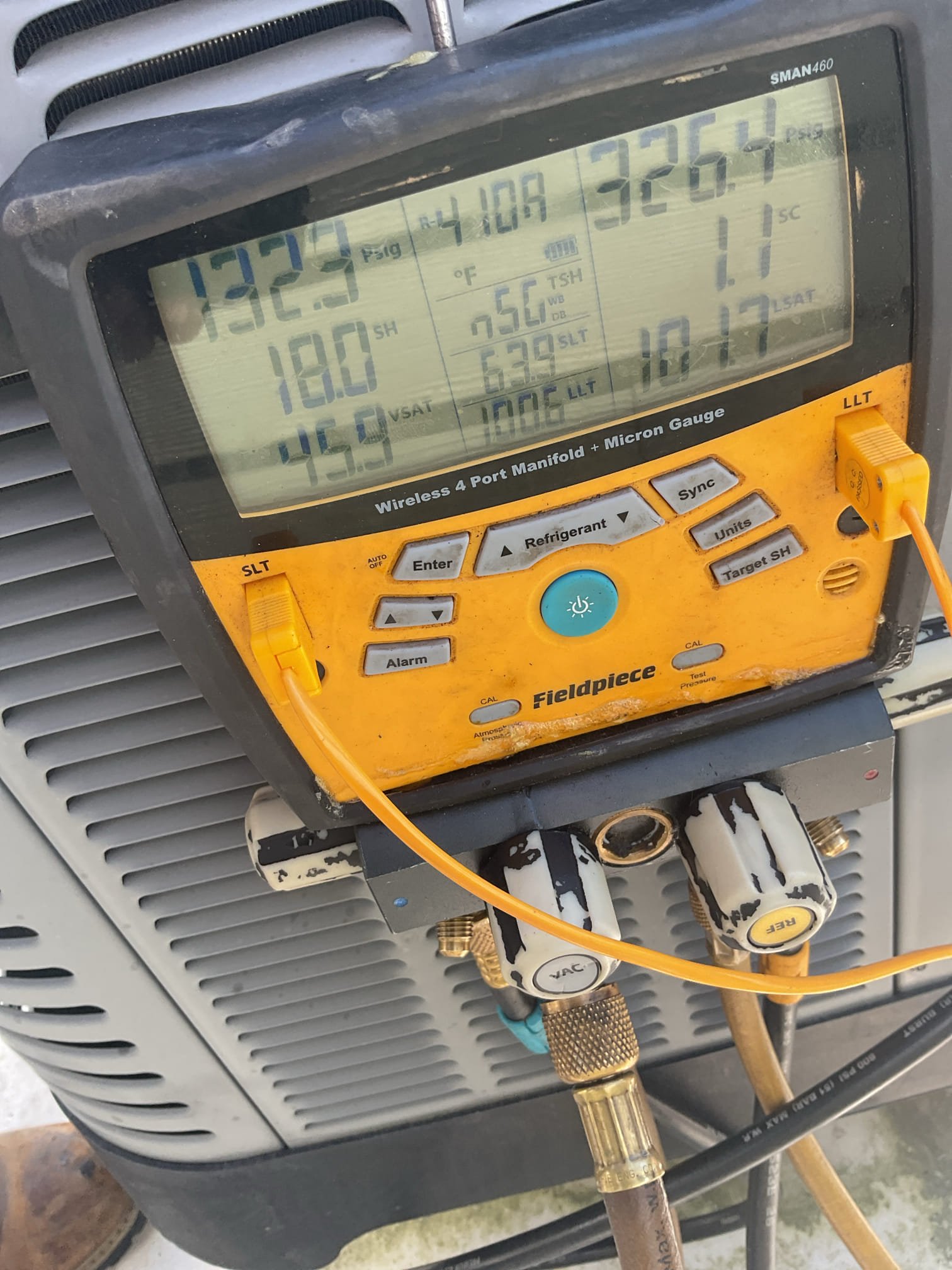 7/23/26. Fully assessed no cooling situation on 2016 Rudd heat pump system. First had to locate outside unit on roof because it was labeled wrong. After locating system Foud heat pump low on charge. R410a pressures were 283/85. Added 2 lbs 410a ( provided by Atwater). Now pressures are 326/122 with 5 subcooling. Temperature split is 19 degrees. Do not know how long charge will last. System is at replacement age. A/c is working at time of service. 