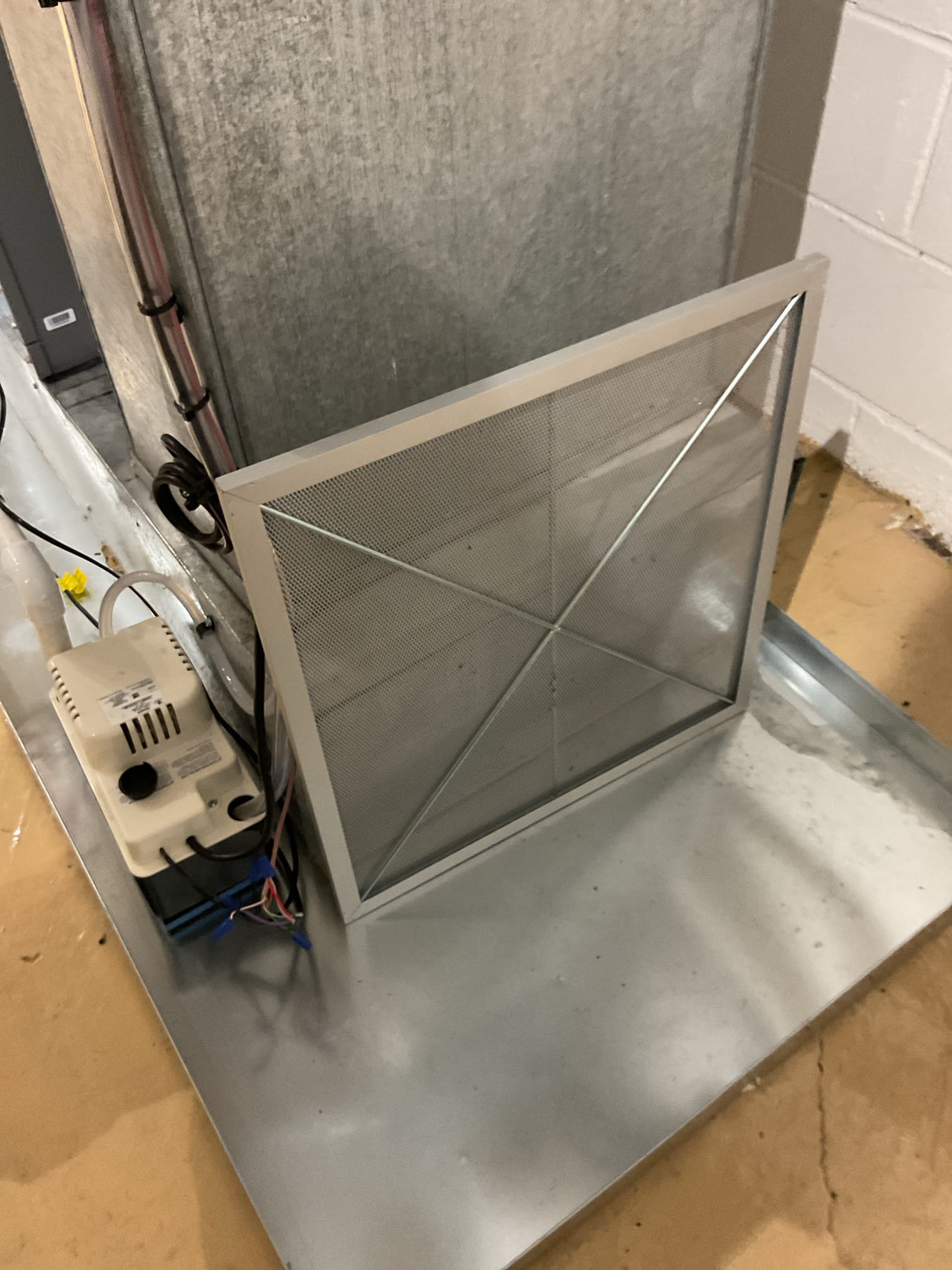 Trane ships these air handlers with a metal frame filter with an open mesh style filter media.
Homeowners thought this could be a screen or a pre filter but this is the filter Trane ships with unit.
We put 20x20x1 MERV 8 pleated filter in Place of the factory mesh filter. 

System operating well at this time. 
