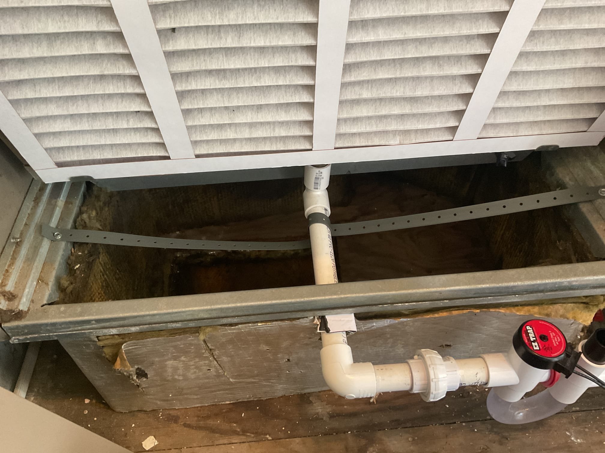 Fiberglass duct 12”x10”x 36” trunk.  22”x12x8” fiberglass trunk. All on return side. Condensation line was broken by sprinkler guy working in closet. Called distributor and got pricing and availability. Picked up single sheet of duct board and made duct work. Collected ballance.