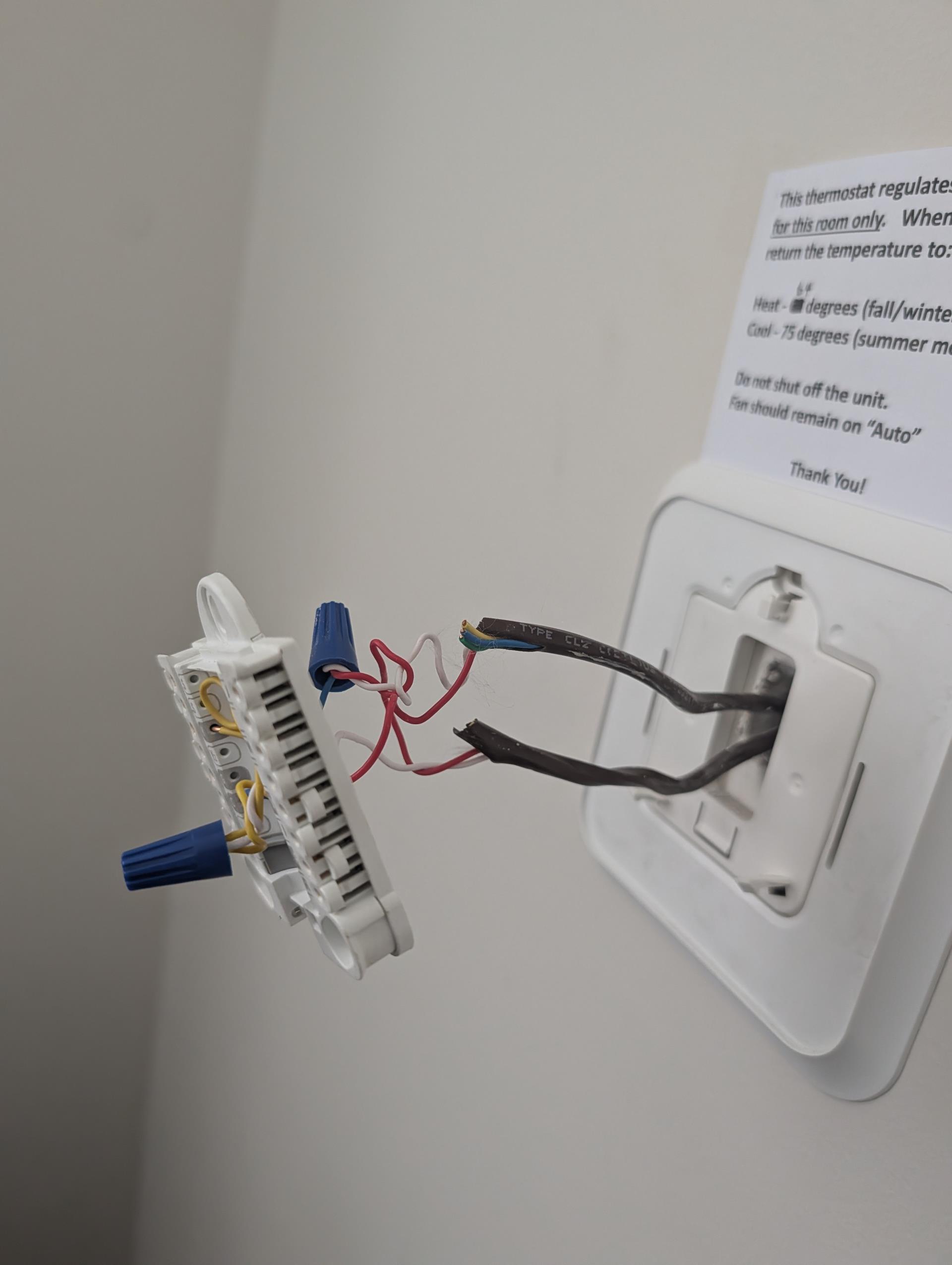 Issue is with the far first floor bedroom and the room immediately above it are remaining warm. 
There are (3) Thermostats in the building.
1st floor thermostat in the foyer/entrance controls the basement system.
The other First floor thermostat (in the problem bedroom)7 on the opposite side of the building controls (2) booster fans only it does not have any control of the heating or cooling equipment. It is the second floor thermostat that controls the heating and cooling for this far first floor bedroom. 
So what happens is the second floor thermostat satisfies and those (2) rooms remain warm. This has not been brought to our attention because up to this point no one has used these rooms. 

It will not be easy to zone this from the ductwork because each supply duct will need its own damper and the tic is very tight. In fact there is an abandoned 8x8 damper.  The best solution here is to install a (2) head Minisplit system. To allow for heating and cooling for these spaces. 

This wil
