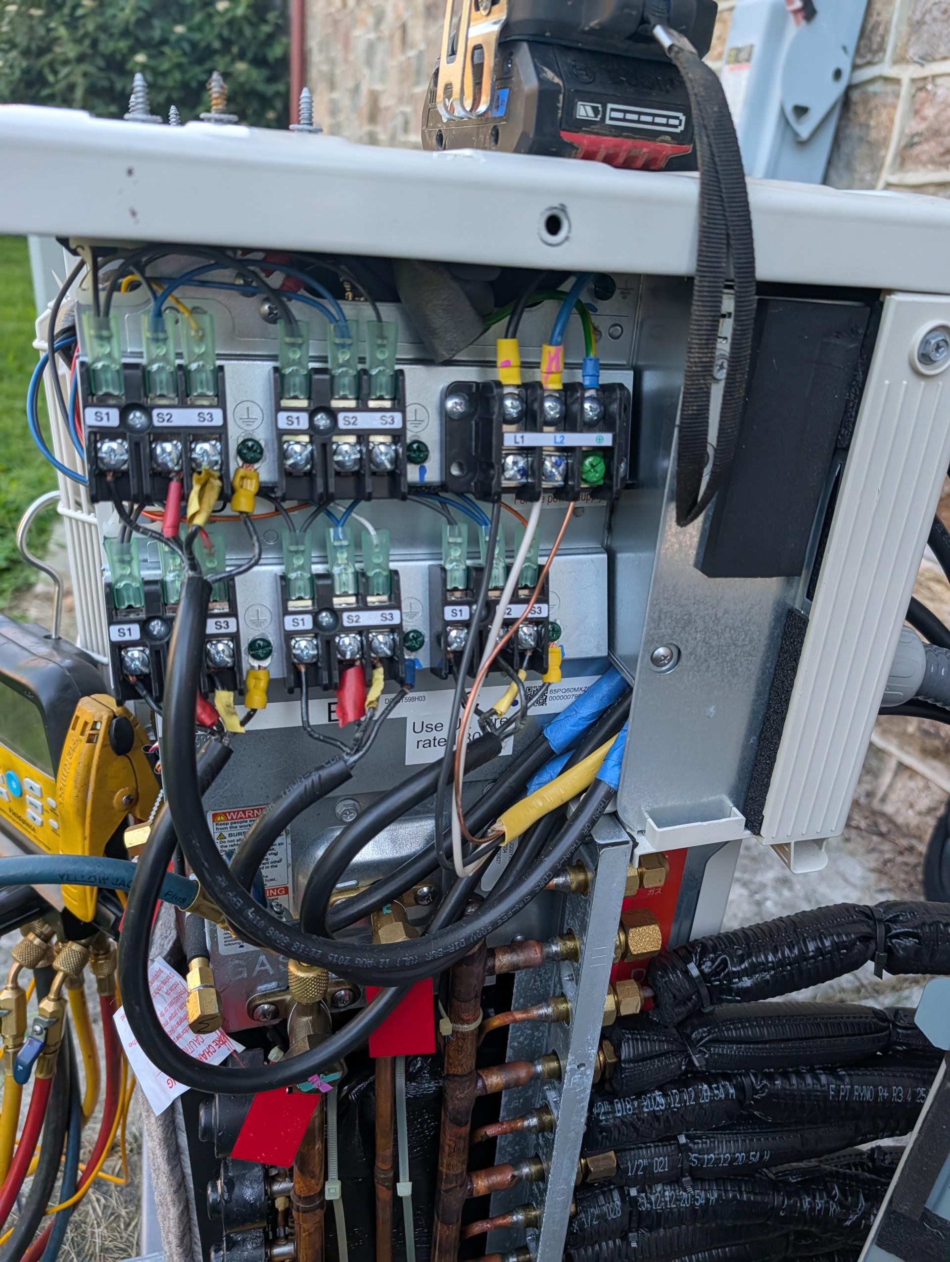 Completed QA for Minisplit with 4 heads:

Checked all aspects of install: Mechanical, piping, wiring.
Checked refrigerant charge 3.5-5° SH with all heads running at full demand cooling.
Checked temperature splits.
Set power monitor under-voltage to 190 over-voltage to 231 (210V circuit).

Installed passes QA inspection 