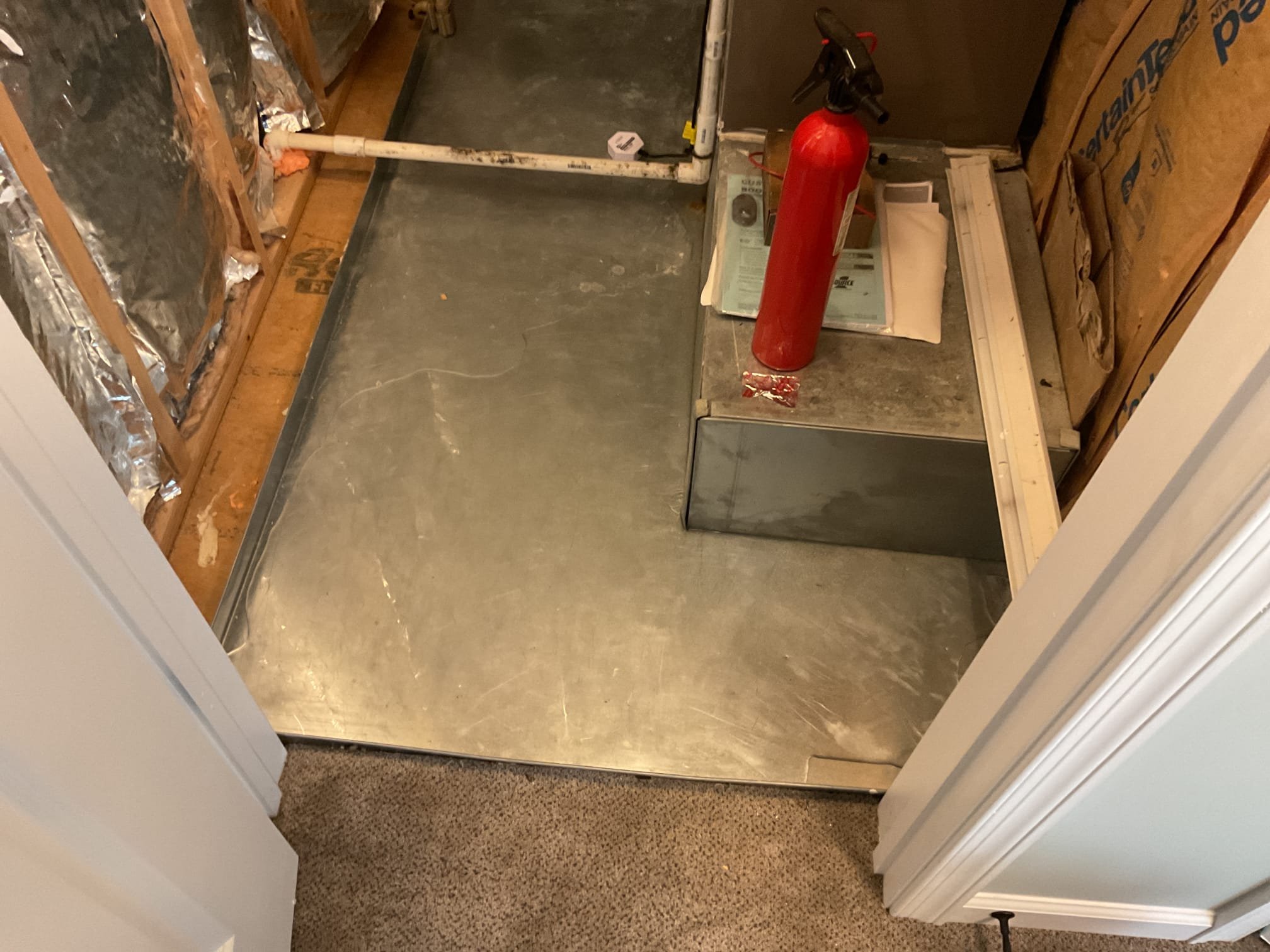 Found condensation lines for 1st and 2nd floor all tie together in basement. Found water backing up into 1st floor gas furnace and 2nd floor drain pan. Explained to homeowner that the 3/4” line that they both tie into has a major blockage. Blew out drain line with nitrogen tank both ways. Water started pouring out other side into the sump pit. Drain line is open again. 2nd floor system does have a wet switch for drain protection in the attic. Homeowner is going to suck up water in drain pan and basement with his shop vac. Drain line is flowing properly at time of service. 