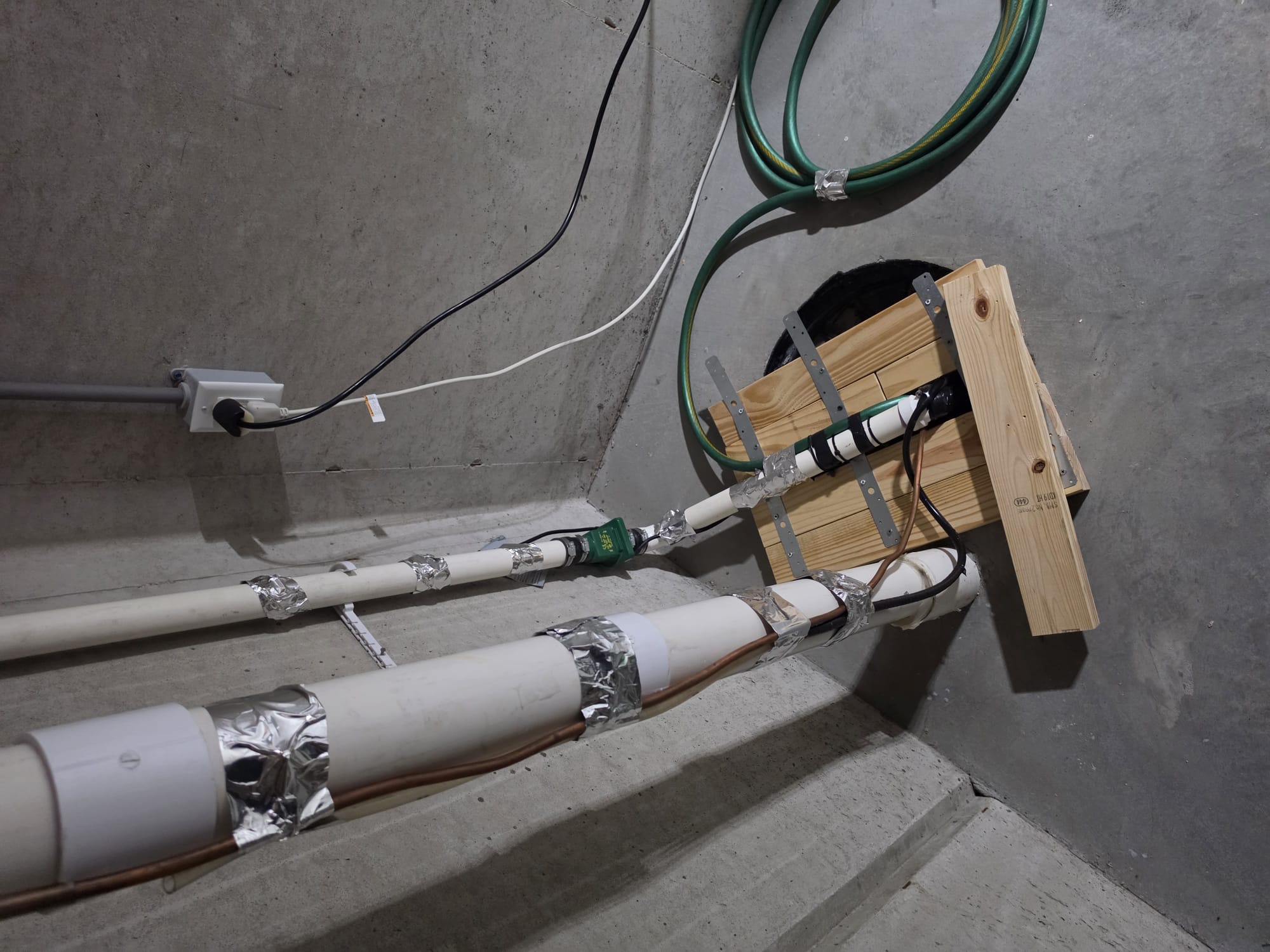 Reviewed the equipment with homeowner and current concerns. Unit is a 40,000 BT per hour B cabinet furnace with 2 tons of air conditioning attached. We will be:
- Replacing the furnace and air conditioner
- Adapting to the venting and gas line
- Replacing the condensate pump
- Replacing the vinyl tubing from pump to sump, which is right behind the unit, approximately 15 to 20 ft of tubing
 We will run a new line set, which is 35 ft, approximately 20 ft to 25 ft from furnace to outside wall. The air conditioner is currently mounted on four pieces of rebar, and a pad is on top of it. That is how the development is done. Don't know why. Customer said we can put the unit on the ground, and I recommended we use pump-up legs, just in case it's an HOA thing for the landscapers. It is on a slight incline, so we can try to put it on the rebar the way it was, but we cannot use a wall bracket. We will be replacing the disconnect and whip to unit. There is a walkout basement, and the breaker size 