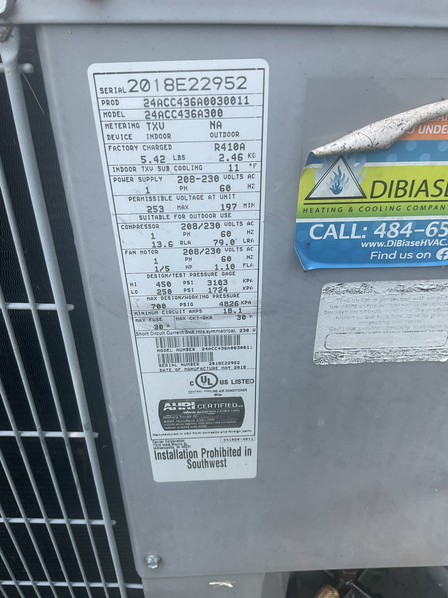 Issue is with odors.
I sprayed the drain pan with drain pan treatment. Brushed out trap.
Homeowner replaced air filter.
Inspected indoor coil. Clean.

Verified fan speed for 3 Ton AC capacity F04 *About 1300 CFM. Good
Checked refrigerant charge suction pressure a little high TXV could be beginning to fail. Provided estimate to replace Carrier unit door coil under parts warranty should it be needed. We will keep our eye on refrigerant performance in upcoming AC tune ups. 

Relative humidity measured in basement 65%
Relative humidity measured at first floor return 72%
Provided estimate for ducted dehumidifier. 

Homeowner is going to invest in a plug in dehumidifier for now. 

AC and recently installed indoor air quality devices are operating well at this time.