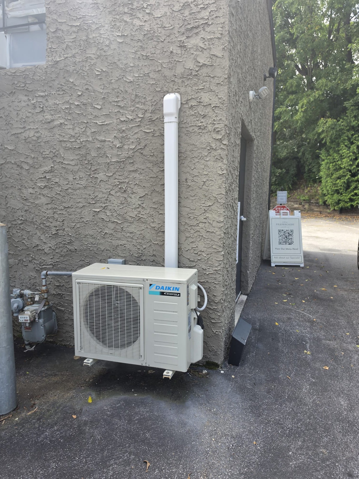 Customer is looking for direct replacement of Daikin ductless system indoor and outdoor components, one-to-one match, and utilizing customer-supplied equipment. The unit sits in the kitchen right by the outside door, and we will reuse wiring, line set, and line hide. There will be no real materials except that I would recommend surge protection for the outdoor unit with a surge disconnect. 