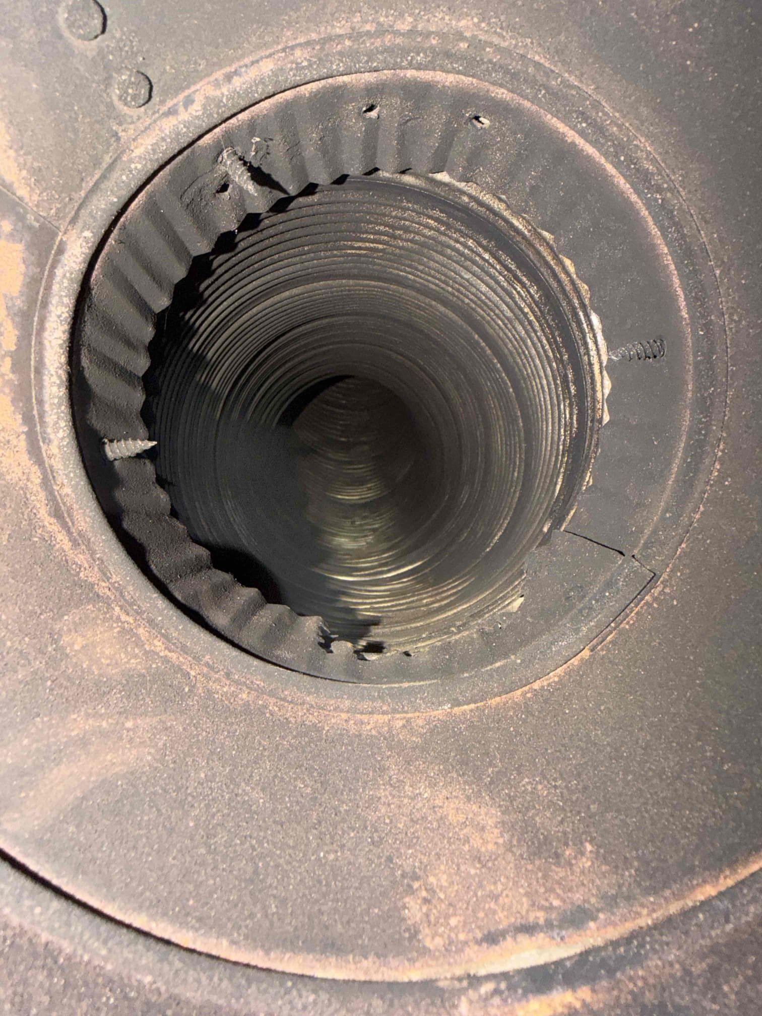 Luis 9-17-26 
Performed oil boiler tune up on Weil McLain boiler from 2014
Component Replacements: Swap out the oil burner nozzle, oil filter cartridge (canister rf1) and the pump strainer screen.
Cleaning & Inspection: Brush and vacuum soot build-up from the heat exchanger sections, flue pipe, and chimney base; clean the CAD cell eye and burner blower wheel.
Ignition & Assembly Setup: Set electrode gap, spacing, and height to manufacturer specifications; check porcelain insulators for cracks.

Combustion Analysis: Test draft over-fire and at the stack, check pump pressure (PSI) and cut-off, test for smoke spot number (#0 ideal), and measure CO_/ 02 and stack temperature to calculate thermal efficiency.
System & Safety Controls: Verify high-limit aquastat shut-off, check system water pressure/temperature, inspect expansion tank air charge, check for fuel leaks, and verify circulator pump operation.

Oil tank is very old, customer is aware. Provided estimate to replace tank 

Some of th