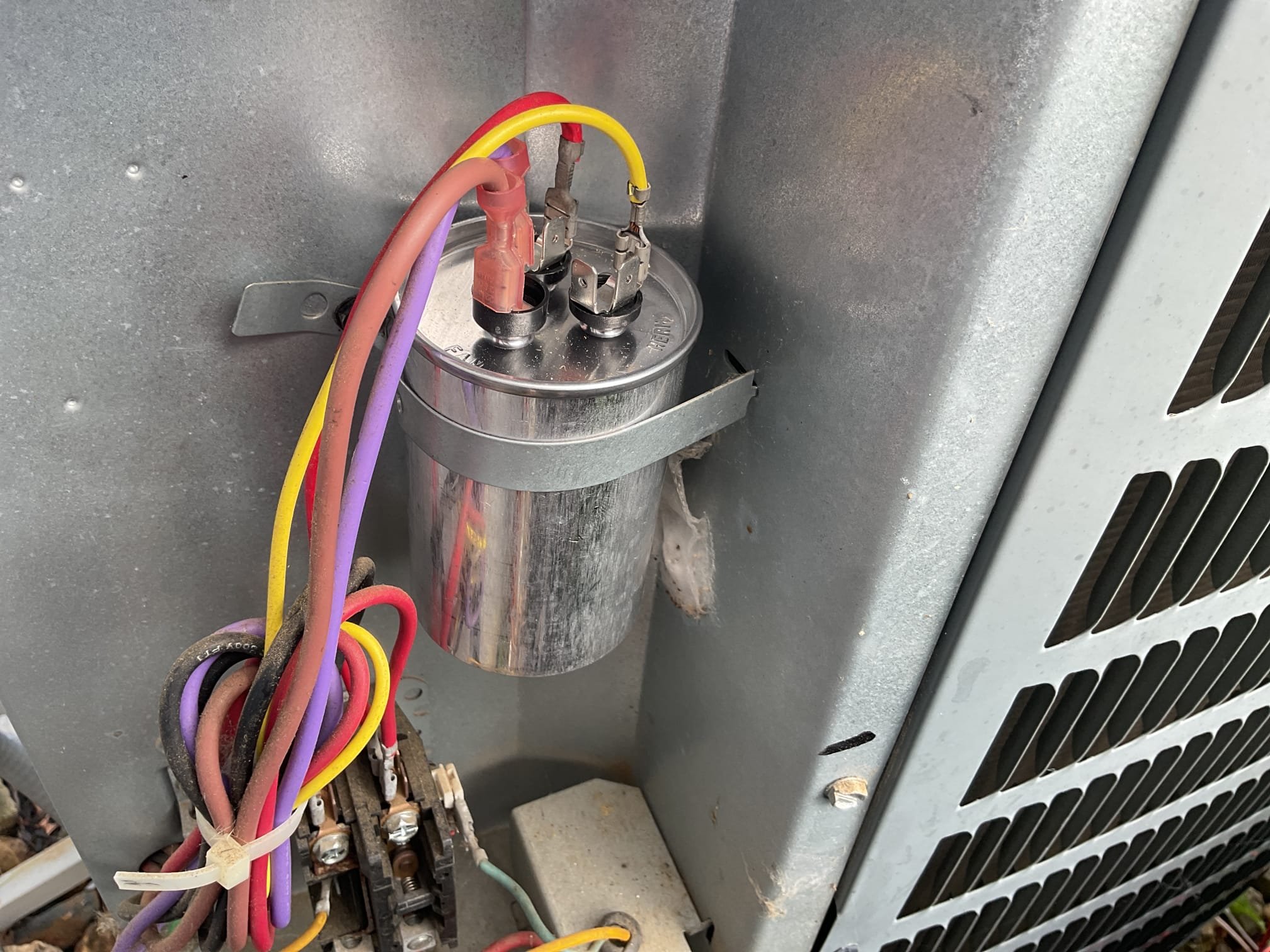 9/17/26. Fully assessed no cooling situation on 2017 Goodman a/c system. Found everything running except compressor. Found 40/5 capacitor tested at 2.9/4.7, failed capacitor. Replaced capacitor and tested operation. Took photos of gauges, refrigarant pressures were good. Temperature split was 20 degrees. Scheduled customer for a free plumbing inspection. A/c is working properly at time of service. 