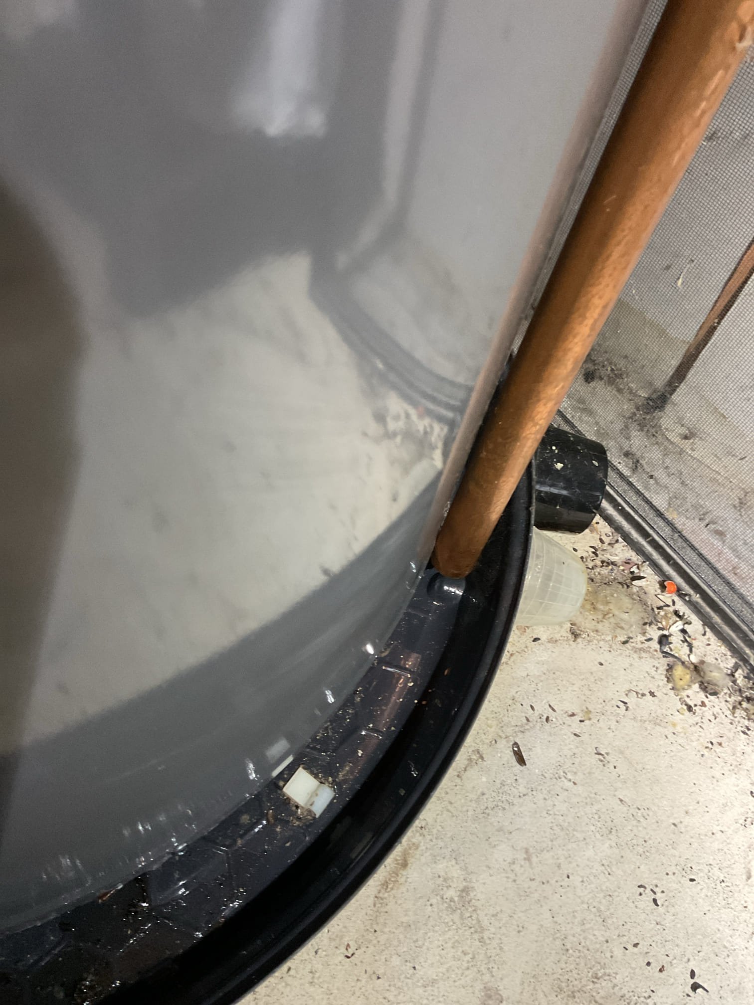 50 gallon electric water heater Rheem has water in pan.
Locked out on built-in water alarm.
The water in the pan is NOT coming from the relief valve. The relief valve piping is dry as is the the part of the pan directly under neath it. There is a small tank leak.  New water heater is needed.
I dried the water sensing rope and left outside pan for temporary hot water. If leak gets worse you must close the valve and turn water heater off. 
The expansion tank is failed (water logged) needs to be replaced as well 
Water pressure 58/psi: Ok 

I used Rheem warranty verification and there is a tank warranty until Feb 14 2031. However this is through Home Depot who typically wants the company whose phone number is listed on the water heater. Our staff will contact Rheem then the homeowner tomorrow to see if we can do the water heater replacement under warranty.

Also provided estimate for new electric water heater with leak sense and 8 year tank warranty AND estimate for professional electric 