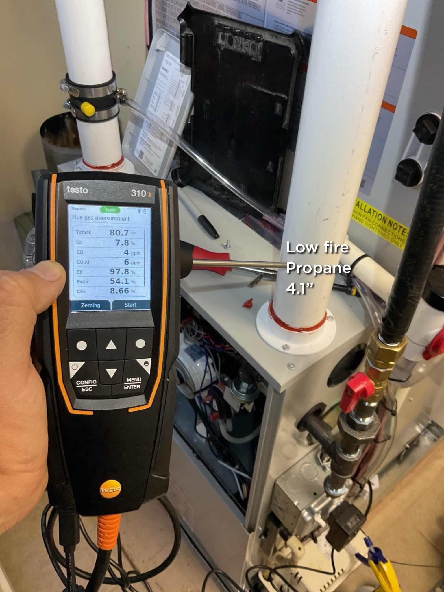 Completed QA for Hubrid system install Bosch propane furnace with Heat pump.

Inspected all aspects of install and tested system operations.
Water safeties are wired to EIM S1 contacts: configured to produce a “Water safety alert” notification and shut off heating and cooling and enable indoor fan, 
Outdoor temperature sensor is wired to EIM S2 contacts.
Aux heat outdoor temperature lockout 45°
Balance point/HP outdoor temperature lockout 30°

Combustion tests in low and hi fire: Pass. 
LO propane pressure target is 4.1 per nameplate 
Hi propane pressure 9.4 (9.22) per nameplate 
Micro leak bubble detection test on gas line: pass 

Temperature rise in heat pump heating 71-100=29° after 12 min run time

We need to come back and replace the 40A double pole breaker for outdoor unit circuit with a 30A (Square D panel)

Install passes QA inspection
 