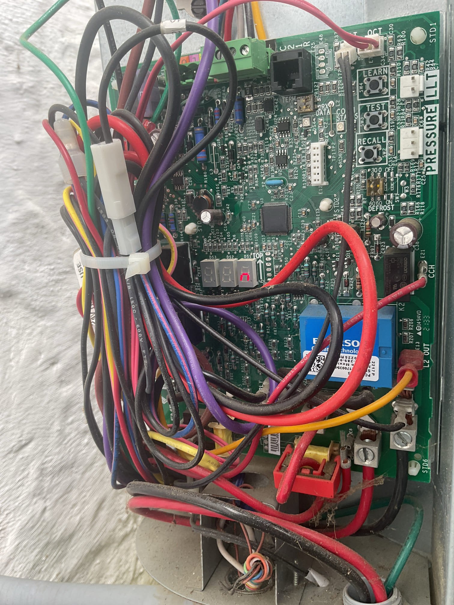 This customer called with no cooling from their 2023 Amana communicating system. Our technician found power to both the indoor and outdoor units but no error codes, so he reset power to the indoor gas furnace; after a 5-minute delay everything came on and tested well, with a 19-degree temperature split and proper 410A refrigerant pressures. The issue was most likely a communication glitch from a power issue in the home, and he showed Kate how to reset the system if it happens again. The air conditioning is working properly.