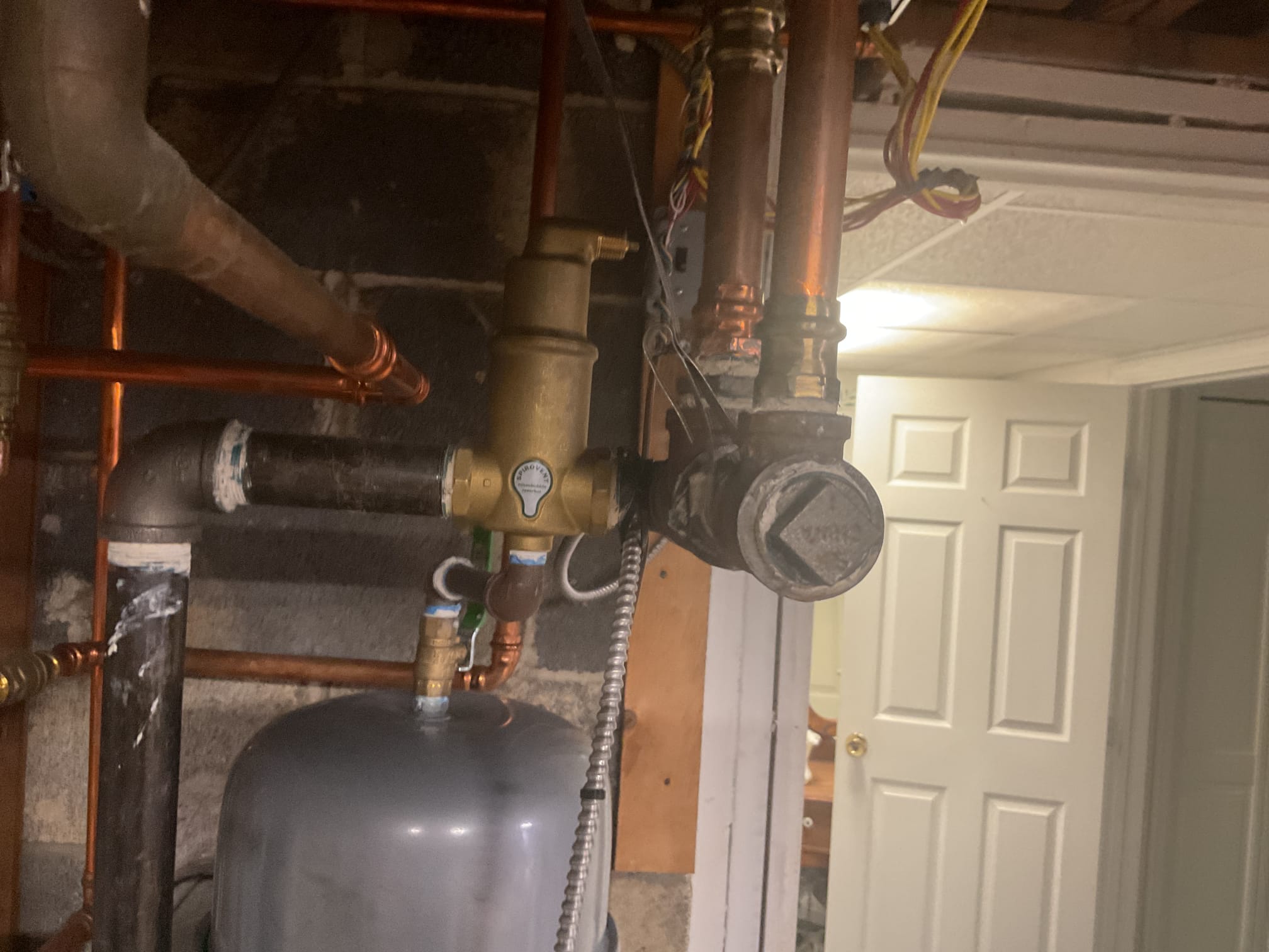 On 9/28/26, I began by inspecting the attic to ensure the EZ Trap was adequately insulated, confirming that it had been properly insulated during the last visit. Next, I conducted a precision oil tune-up on the 2020 Weil McLain oil boiler. This involved vacuuming soot from the heat exchanger and chimney base to enhance efficiency and safety. I replaced the .85x60b nozzle and the Rf1 oil filter to ensure optimal performance. Following the replacement, I performed a smoke and combustion test to verify that the boiler was operating correctly. Lastly, I provided an estimate for installing a WiFi rope leak detection system for the boiler, which will help in early detection of any potential issues. The boiler is currently functioning properly.