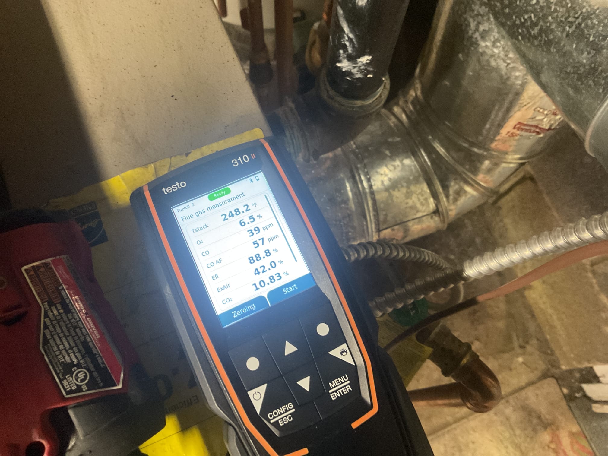 On 9/28/26, I began by inspecting the attic to ensure the EZ Trap was adequately insulated, confirming that it had been properly insulated during the last visit. Next, I conducted a precision oil tune-up on the 2020 Weil McLain oil boiler. This involved vacuuming soot from the heat exchanger and chimney base to enhance efficiency and safety. I replaced the .85x60b nozzle and the Rf1 oil filter to ensure optimal performance. Following the replacement, I performed a smoke and combustion test to verify that the boiler was operating correctly. Lastly, I provided an estimate for installing a WiFi rope leak detection system for the boiler, which will help in early detection of any potential issues. The boiler is currently functioning properly.