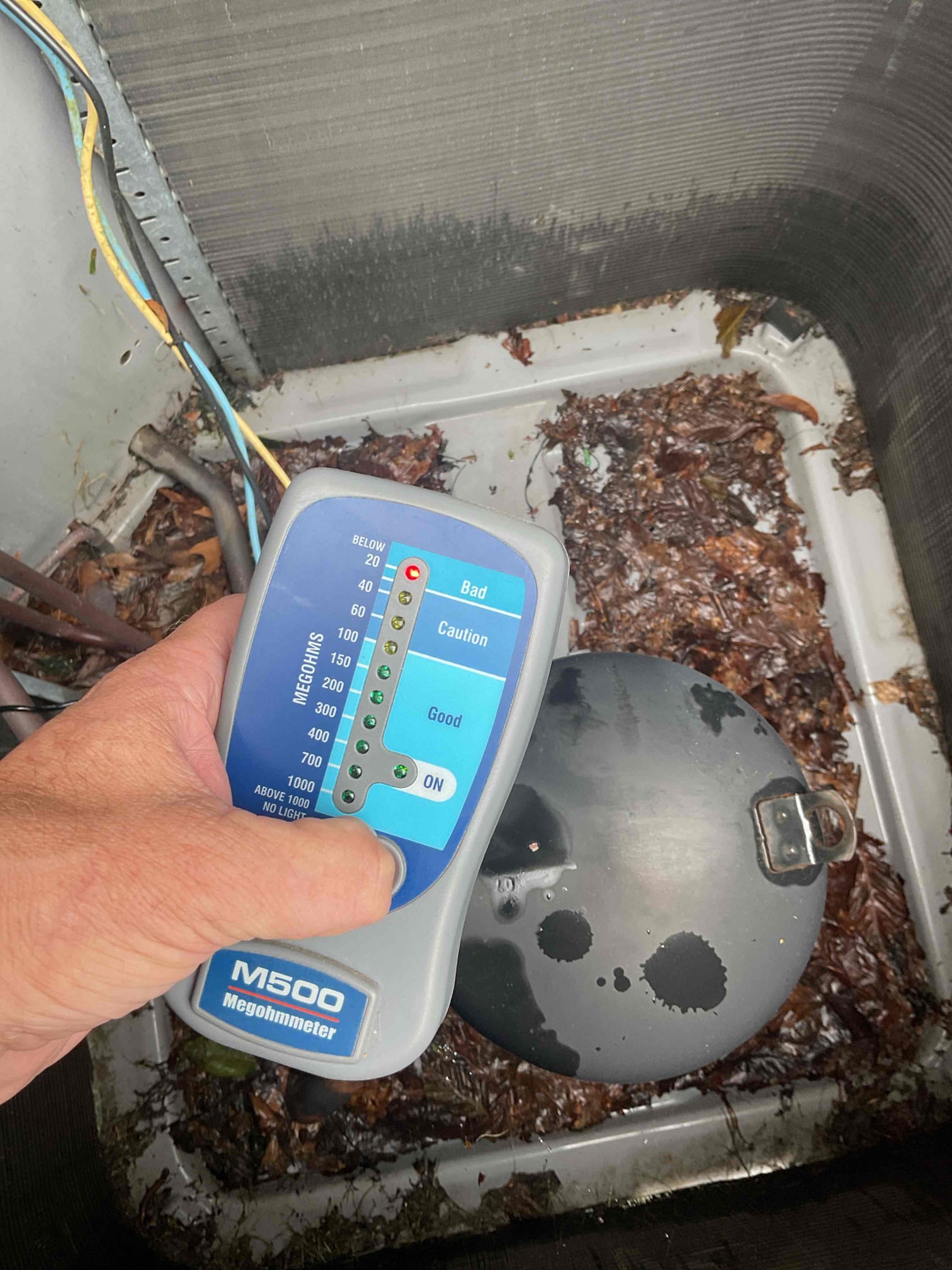 On 9/28, I inspected an outdoor AC unit that was tripping the indoor breaker. The unit, over 15 years old and using R-22 refrigerant, required a thorough examination. After removing the top, I inspected the compressor and found the terminals' pins to be severely degraded. This failure was confirmed by a mega ohm test. I collected my $99 fee via credit card. Bob will present replacement options later.