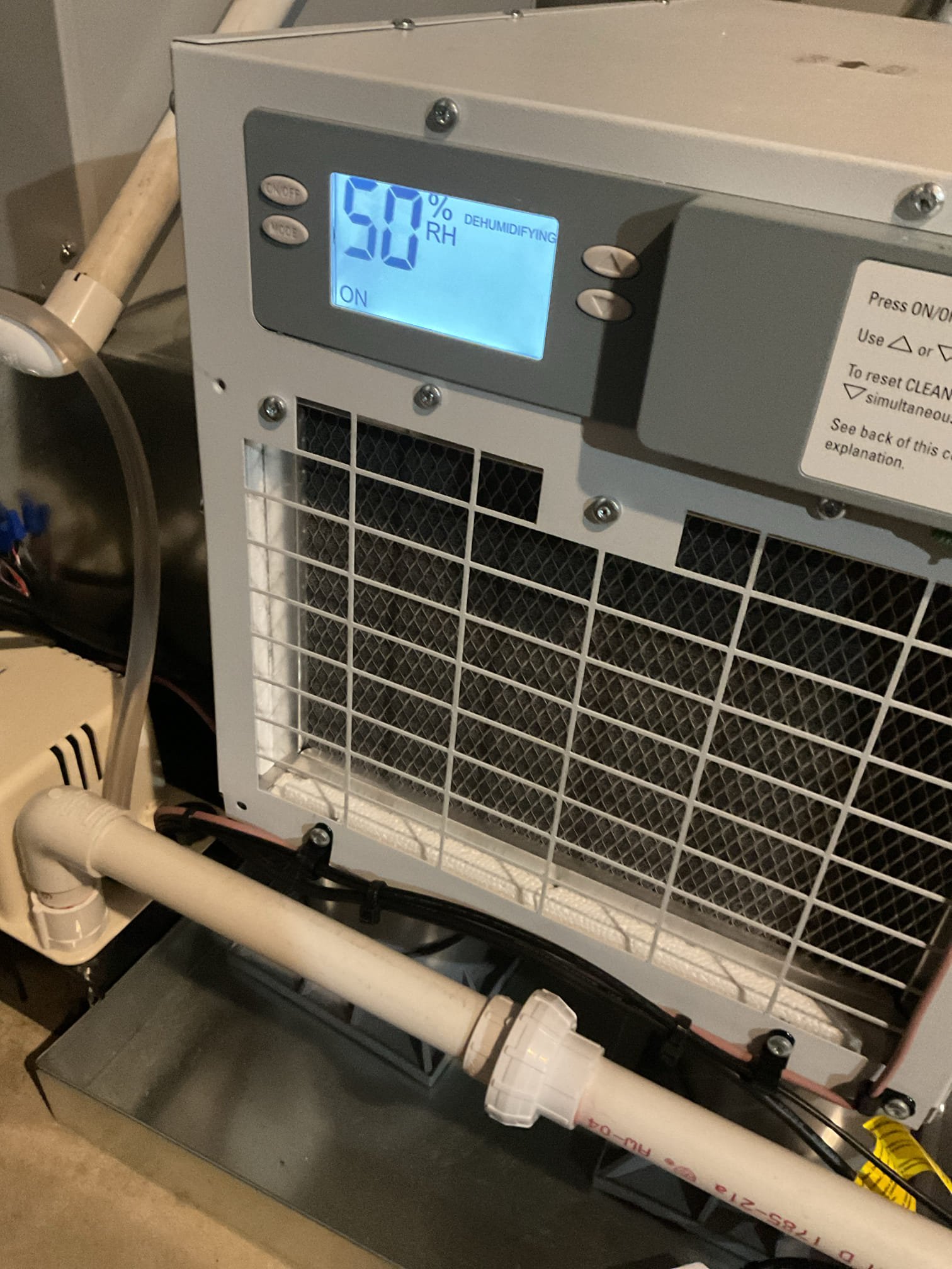 On 9/30, I visited to assist with a dehumidifier issue. The customer had difficulty removing the air filter, which I had previously secured with a 90-degree connector. I demonstrated the proper method to remove the connector, allowing the filter to be replaced. Additionally, I compared humidity readings using my sling psychrometer against the customer's portable sensors, explaining the differences. I adjusted the dehumidifier's set point to 50% for optimal performance. This service was provided at no charge under warranty.
