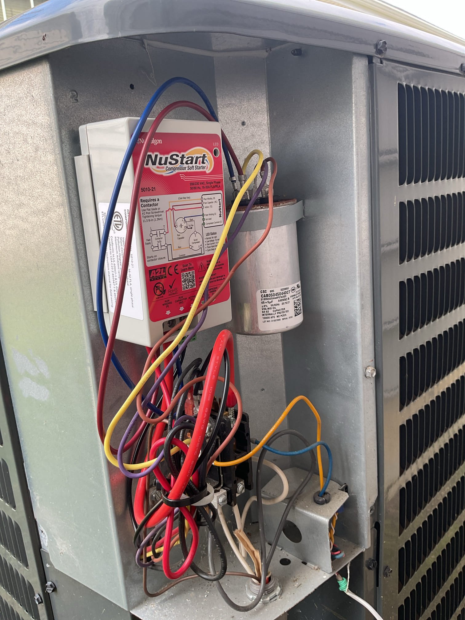 On 9/30/26, I was tasked with installing a soft start compressor device in an outdoor unit. Upon arrival, I began by safely powering down the unit at the disconnect. I then removed the existing hard start relay kit and mounted the new soft start kit in its place. Following the manufacturer's directions and system specifications, I carefully wired the soft start to ensure compatibility with the unit's nameplate and tonnage. After confirming the accuracy of my wiring, I powered the system back on and conducted a thorough test of its operation. I explained the new soft start kit to the customer and recorded the compressor's amperage for their records. The customer expressed satisfaction with the work and paid the total due of $398.65 via credit card.