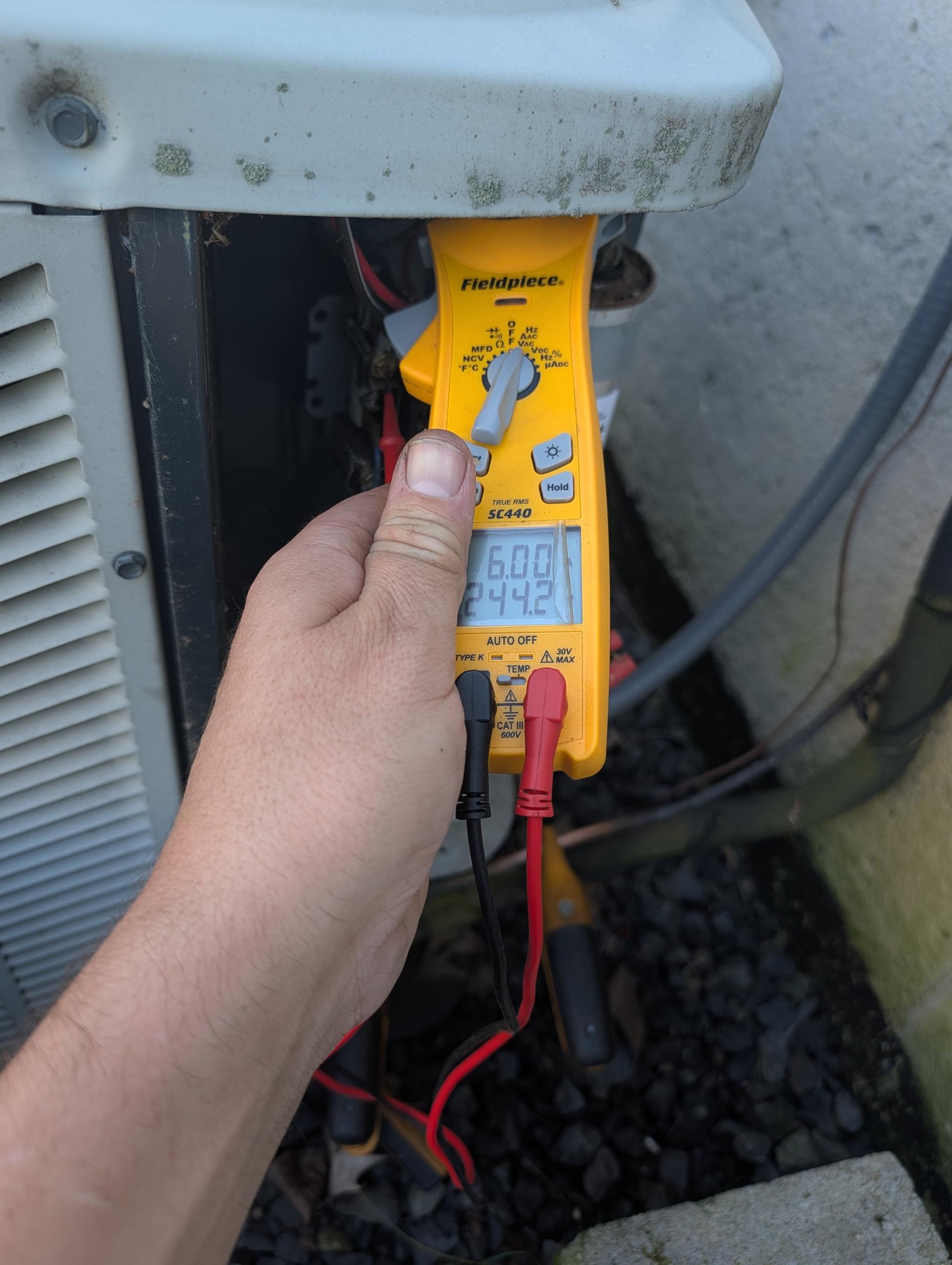 I inspected the 2004 gas furnace and AC system. The homeowner attempted to use the AC for the first time in a month, but there was no power to the indoor equipment. The emergency switch at the top of the stairs was off. After testing, I found the system adequately charged with R22 refrigerant. Electrical components and amp draw were good. The drain was clear but lacked recommended water safeties. The furnace passed the combustion test and visual inspection. Both systems are 22 years old and show significant wear. I recommended upgrading them, but the homeowner is selling and not interested in consultations. The first floor system is now operating.