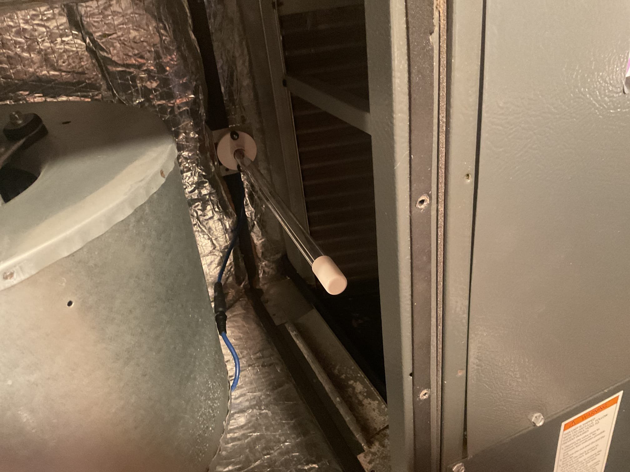 On 10/1/26, I assessed a 1-bedroom area with a musty odor. The thermostat was set at 71 degrees, and humidity was 57%. The temperature split was 19 degrees, and refrigerant pressures were fine. Ductwork was properly connected. The home has two gable vents and a non-functional exhaust fan, which I recommended replacing. I installed a UV bulb assembly after cleaning bacterial growth. I also informed the homeowner about energy audit programs to address humidity issues. The A/C was functioning correctly.