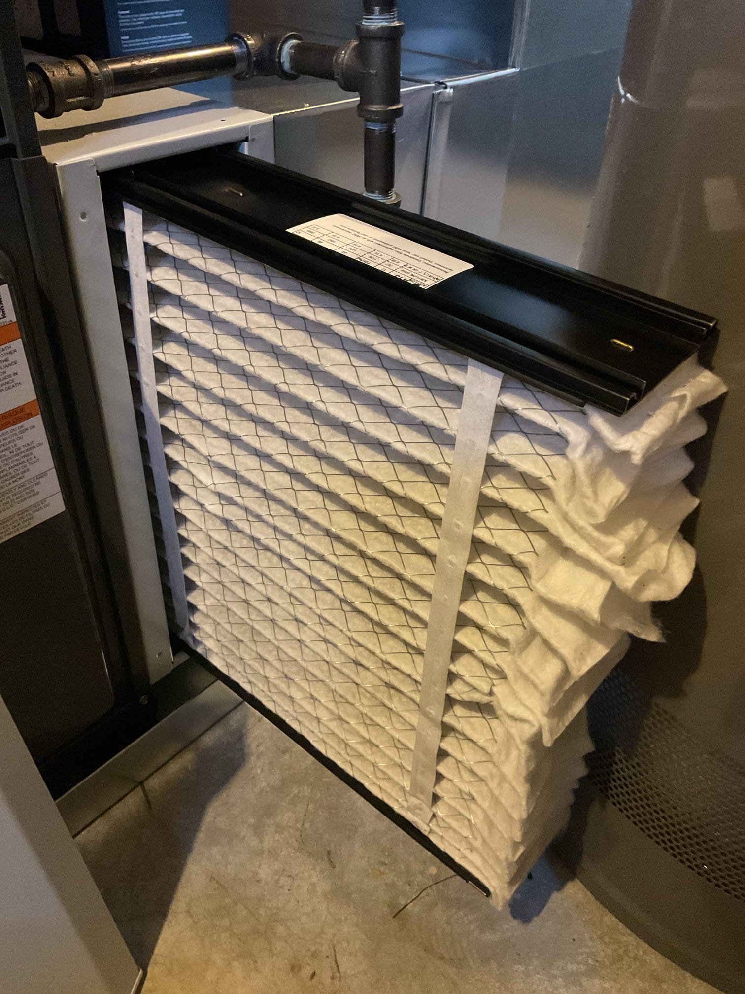 On October 2, I conducted a comprehensive Quality Assurance Inspection on a newly installed 2-stage Goodman 95% gas furnace and A/C system. I began by examining the air filter, confirming it was the correct 4I3 size. I assessed the system's overall neatness and performance, ensuring all accessories were properly installed. I meticulously checked electrical connections and voltages, inspected and tested the burners, flame sensor, and igniter. I performed a water test on all tubing and hoses, ensuring no leaks. I inspected the exhaust and fresh air pipes for any restrictions or abnormalities. The inducer and blower motor operations were tested, and I checked for combustion and temperature splits. The outdoor A/C unit was also inspected, and I verified system levels and disconnect levels. All penetrations were sealed, and electrical connections were double-checked for proper caps. Everything was found to be in excellent working order.