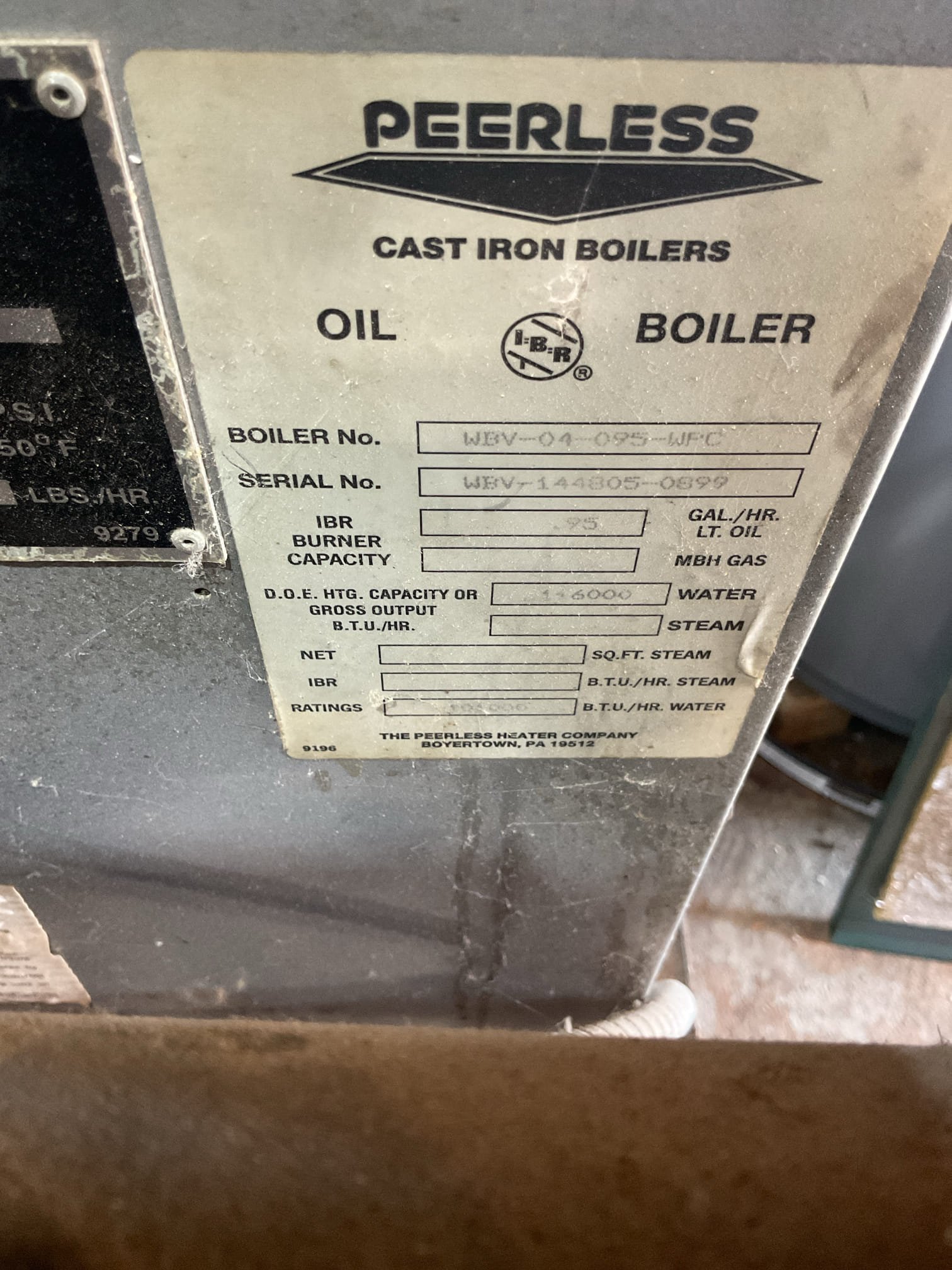 I performed a comprehensive oil boiler tune-up on a 2001 Peerless boiler. This included standard preventative maintenance, such as cleaning and vacuuming the heat exchanger, flues, and combustion chamber. I replaced the oil burner nozzle and oil filter cartridge, inspected and cleaned the electrodes, and checked the cad cell eye flame detector. Safety controls were tested, including the low water cut-off and emergency shut-off switch. A flue gas analysis was conducted, revealing advanced thermal stress and significant refractory breakdown inside the combustion chamber. Water pressure and temperature were fine, but the water feeder was difficult to open. The boiler showed major wear, with the pressure relief valve and flue pipe exhibiting significant corrosion and rust. The oil canister had substantial sediment and rust. I provided an estimate for necessary repairs and recommended replacing the system due to its current operational status and exceeded life expectancy.