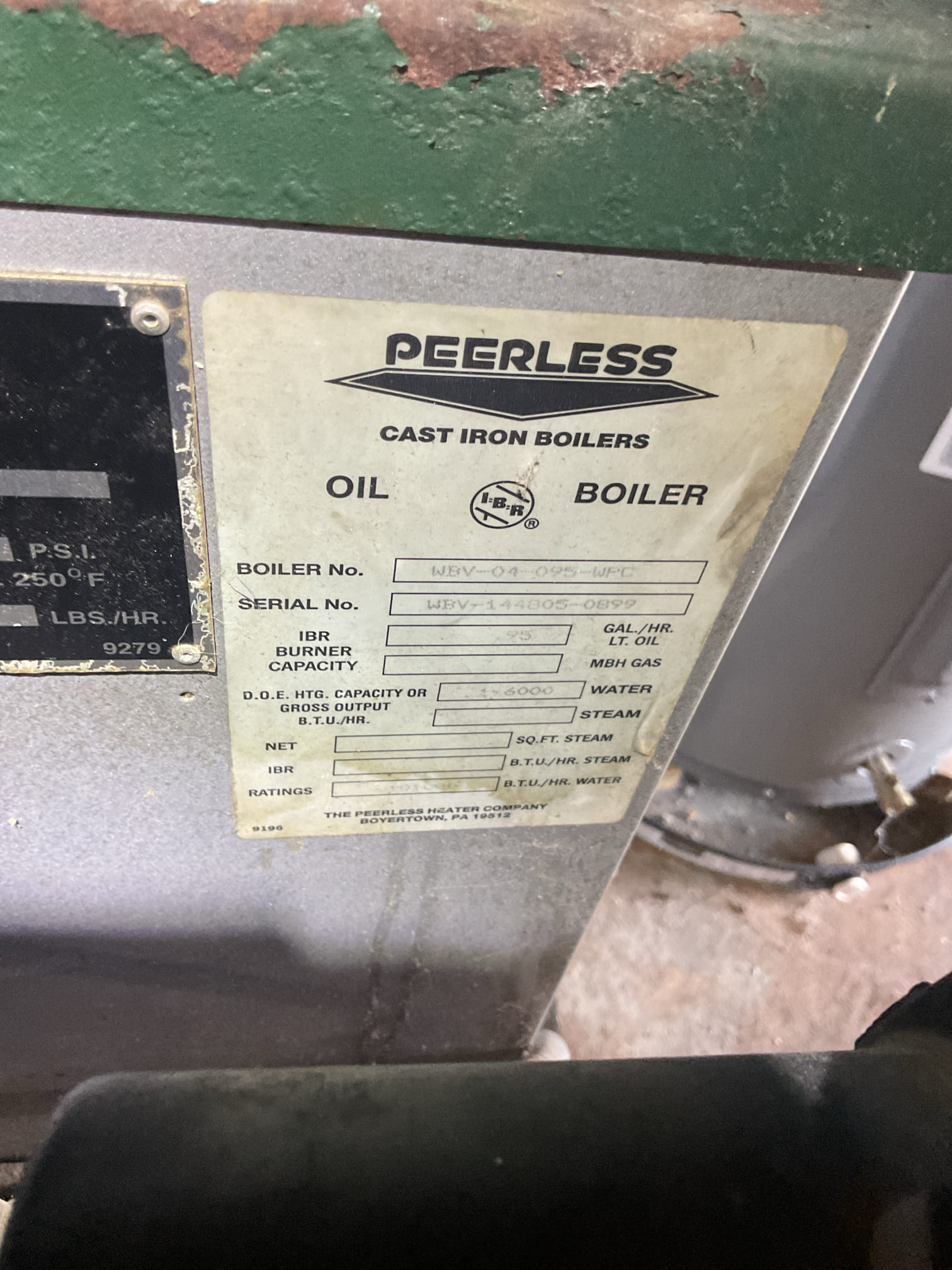 I performed a comprehensive oil boiler tune-up on a 2001 Peerless boiler. This included standard preventative maintenance, such as cleaning and vacuuming the heat exchanger, flues, and combustion chamber. I replaced the oil burner nozzle and oil filter cartridge, inspected and cleaned the electrodes, and checked the cad cell eye flame detector. Safety controls were tested, including the low water cut-off and emergency shut-off switch. A flue gas analysis was conducted, revealing advanced thermal stress and significant refractory breakdown inside the combustion chamber. Water pressure and temperature were fine, but the water feeder was difficult to open. The boiler showed major wear, with the pressure relief valve and flue pipe exhibiting significant corrosion and rust. The oil canister had substantial sediment and rust. I provided an estimate for necessary repairs and recommended replacing the system due to its current operational status and exceeded life expectancy.