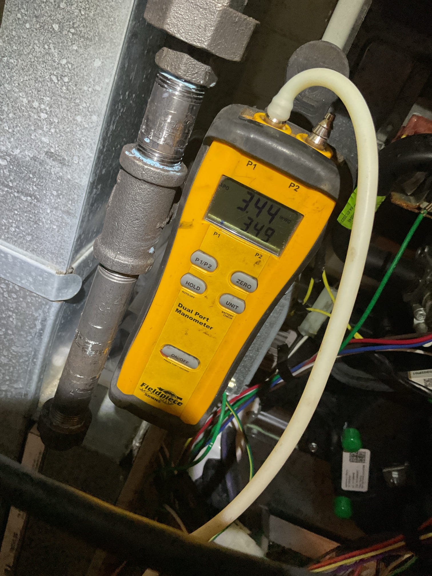 On October 6, I investigated a persistent system fault where the heat was not functioning correctly. The customer reported that the system started with room temperature air, transitioning to warm air after a few minutes. Upon inspection, I found ignition/combustion interruptions and misfires. I cleaned and adjusted the components to restore stable operation. The burners showed heavy corrosion, leading to intermittent fuel delivery, and I recommended replacing them. Additionally, I noticed accelerated corrosion on electrical connections due to elevated moisture levels. I suggested installing a supplemental dehumidifier to control humidity and extend the system's lifespan.