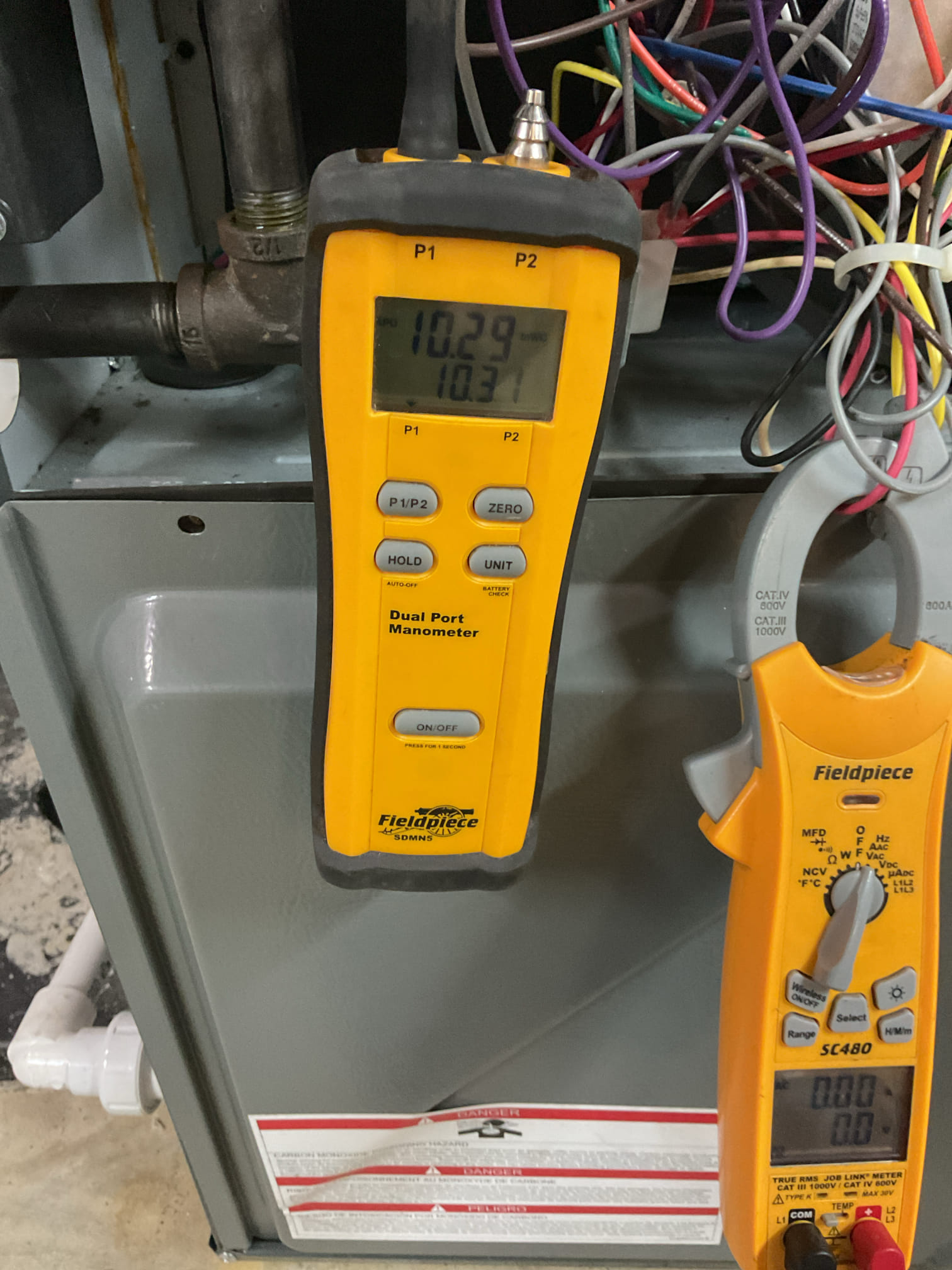 On 10/8/26, I performed a comprehensive service check on a 4-year-old Amana 95% gas furnace. I began by inspecting the air filter, which was in good condition, and then serviced the 700 humidifier, ensuring it functioned correctly. I checked all electrical connections and voltages, inspected the heat exchanger, and tested the burners, flame sensor, and igniter. The burners were found to be dirty in the crossover section. I also tested all tubing and hoses for leaks, inspected the collector box, and checked the exhaust and fresh air pipes for obstructions. The inducer and blower motor were inspected for proper operation. Temperature rise splits were taken at the return and supply. The system is currently running fine.