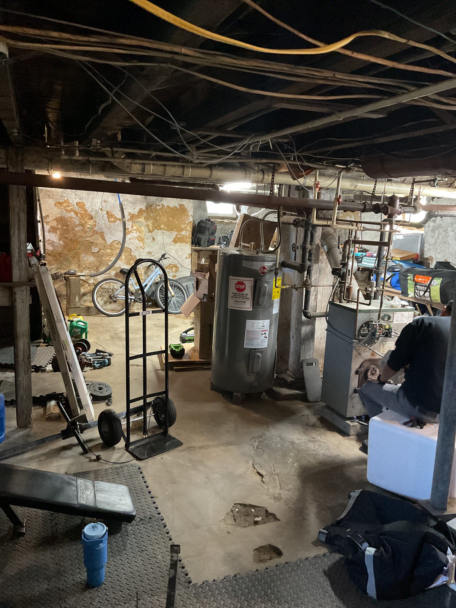 On October 9, I conducted a comprehensive inspection and tune-up on a 2009 Peerless oil boiler. Upon arrival, I tested the system's operation and found the boiler to be heavily soiled. I began by cleaning the flue pipe chimney base, which was almost completely obstructed. After clearing the restriction, I cleaned the heat exchanger. I replaced the oil filter, nozzle, and strainer, as all oil components were in poor condition. The oil tank appeared to have a significant condensation issue, and the oil quality was poor, suggesting water contamination. I tested the boiler operation post-cleaning, performed a combustion test and smoke test, both of which were satisfactory. Water pressure and temperature were also within acceptable limits. However, the boiler piping showed significant wear and tear, and the water feeder was not functioning correctly. The boiler is currently operational but requires attention. I recommend obtaining an estimate for boiler and oil tank replacement. I contacted