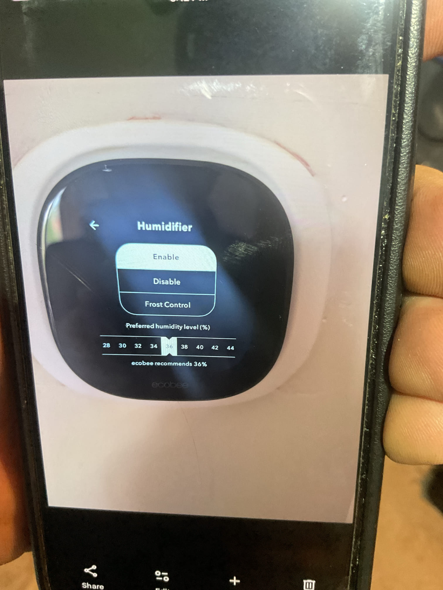 I performed a comprehensive heat tune-up on a climate master Geothermal heat pump with a 17.5 K electric heat kit. The 30x36x2 filter was found to be in good condition. I also completed humidifier maintenance for the Aprilaire 700 humidifier, replacing the 35 water panel and ensuring it operates correctly with the humidity setpoint controlled at 36% RH via the Ecobee thermostat. I inspected the wiring, controls, and electric motors, verified the amp draw of the auxiliary heat, and checked refrigerant pressures, which were 308/107 R454B. The system's temperature rise and water temperature delta were within acceptable ranges. The condensate pump was tested and treated with drain solution. The REME Halo cell, last replaced in winter 2025, will need replacement in winter 2027. The system is currently operating well.