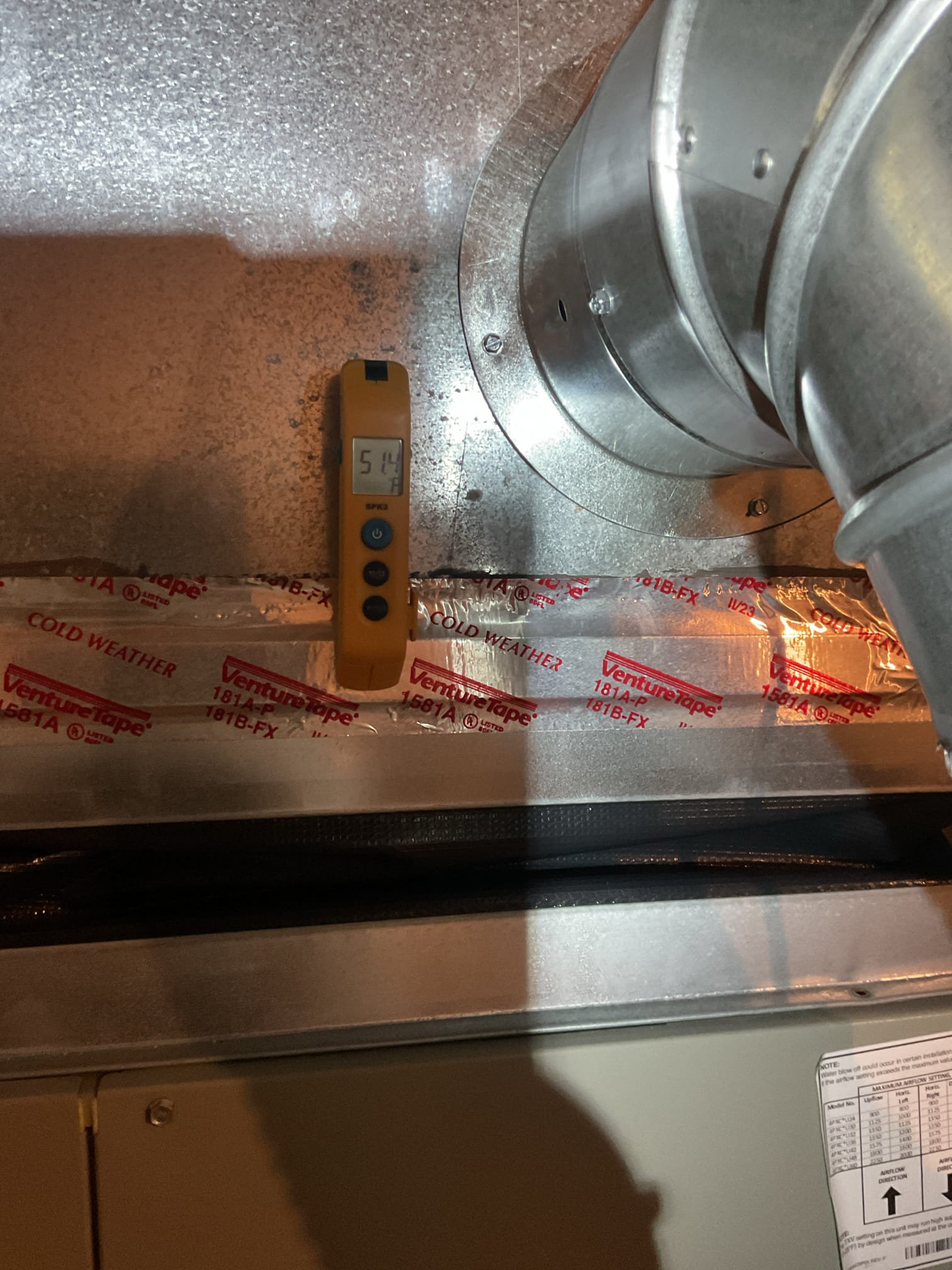Upon inspection, we identified a tripped wet switch caused by water in the furnace auxiliary pan. The issue stemmed from a cracked 3/4” CPVC fitting that was dripping water onto the return duct, seeping through the snap lock seam into the return and eventually reaching the furnace. To resolve this, we first shut off the hot side valve and drained the water lines. We then replaced the leaking 3/4” CPVC elbow along with the necessary couplers. After ensuring no other leaks were present, we dried the HVAC equipment pan and reinstalled the wet switch. Additionally, we dried the area under the condensate pump and cork pad risers. We turned on the power vented water heater and tested it, followed by replacing the furnace filter. System operations were tested, achieving a cooling temperature split of 20°. To ensure thorough drying, we recommended setting the thermostat to fan On for 24 hours.