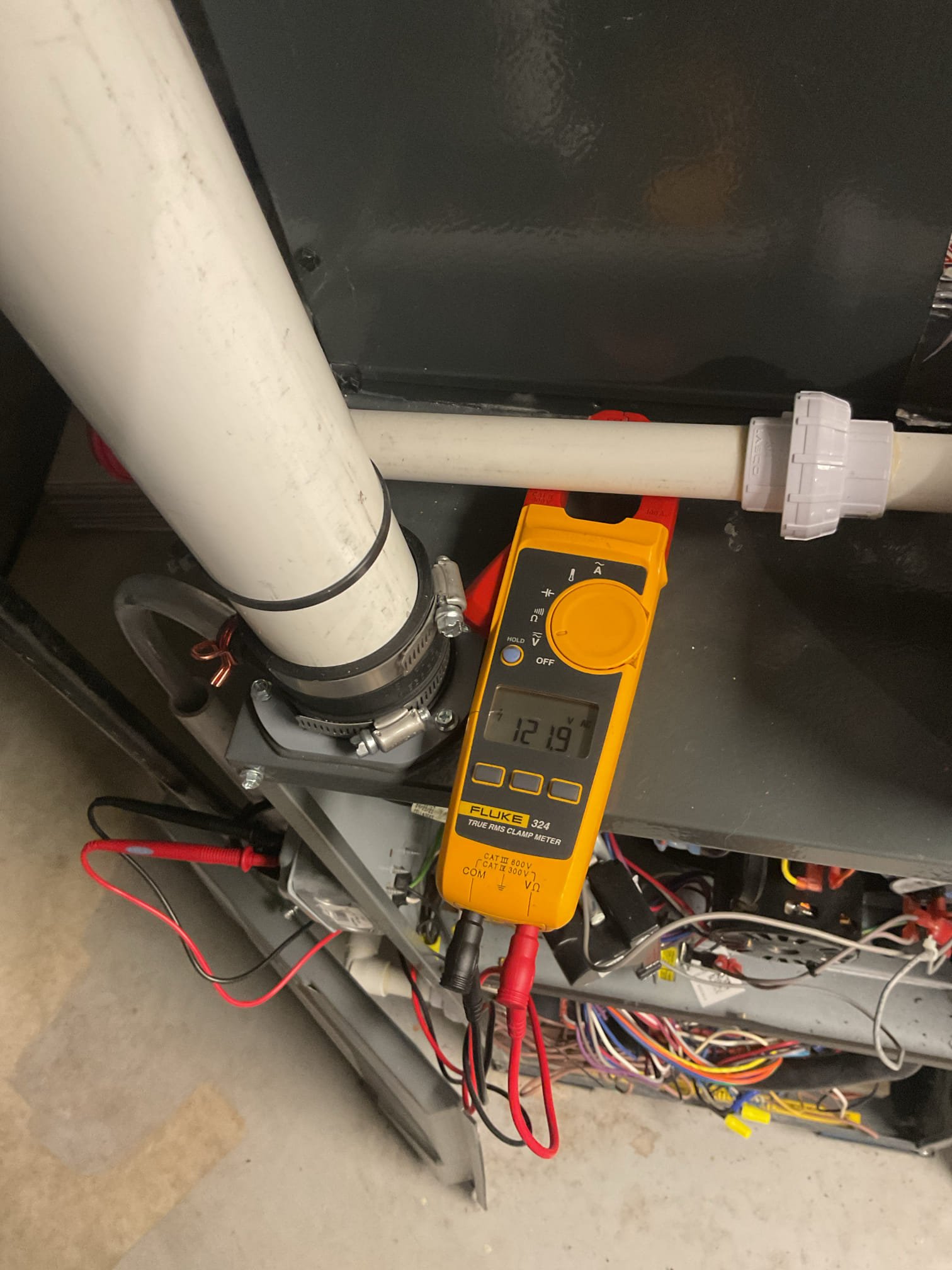 On October 14, I assessed a no-cooling issue with a 2021 Amana communicating hybrid system. Using the Cool Cloud, I connected to the indoor unit and identified a major low line voltage error, causing the system to lock out. This error arises when the incoming line voltage is insufficient for the communicating system to operate. I explained to the customer that no action could be taken until the voltage normalized. After power restoration, I reset the indoor and outdoor unit breakers, tested the system, and checked voltages and 410A refrigerant pressures. During the visit, a power outage occurred, and the backup generator activated, prompting me to inform the customer about potential breaker resets.