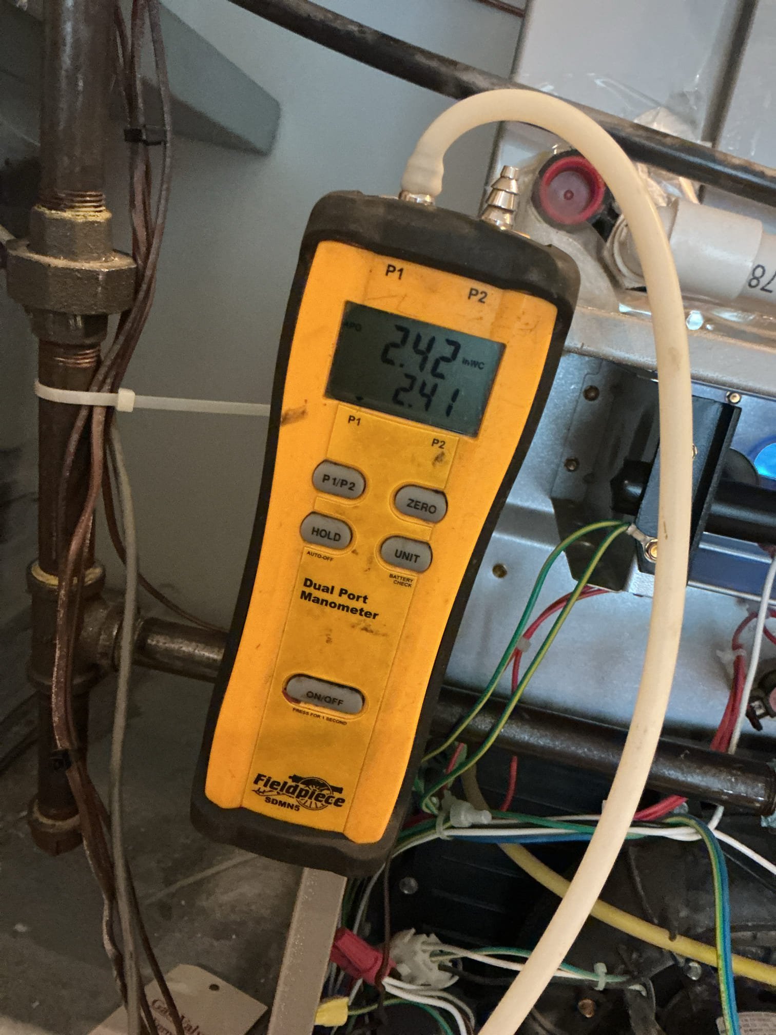 On October 14, I conducted a gas heat safety inspection on an 8-year-old Carrier 90% system. Upon testing, the system was found not functioning due to a pressure switch error. The inducer motor was locked, but after manually forcing it to spin, the system started working. I explained to the customer that this issue is common in such heaters and advised that the system could last a few more years or just weeks. I performed a combustion test, checked the supply and return air temperatures, and found the gas pressure on the manifold side to be low. I recommended contacting Peco to assess the incoming gas pressure. Additionally, the water float switch was malfunctioning, and the humidifier was in poor condition. I provided an estimate for rebuilding the humidifier and offered an upgrade option. The customer opted to replace the humidifier with a new model, install a water sensor, and add a low-level carbon monoxide detector.