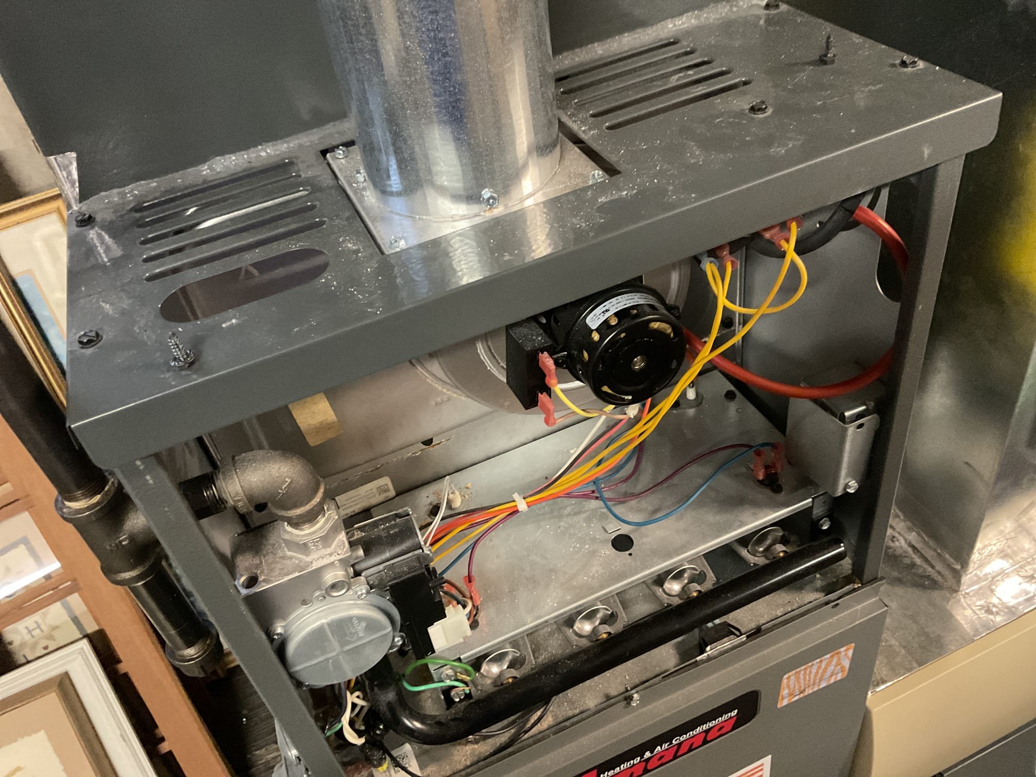On 10/14/26, I conducted a comprehensive heat tune-up on a 2019 Amana 80% gas furnace. I meticulously checked all electrical connections and components, ensuring they were secure and functioning correctly. I connected the S1200 thermostat to the app and removed the existing schedule to prevent confusion. I also checked the temperature rise, cleaned the flame sensor, and assessed the HSI resistance. A combustion test was performed, and I discovered that the Aprilaire 600 humidifier's drain tube was pinched and the drain spud was damaged. I provided an estimate for repairs and replaced the Aprilaire 413 air filter. The furnace is now operating efficiently.