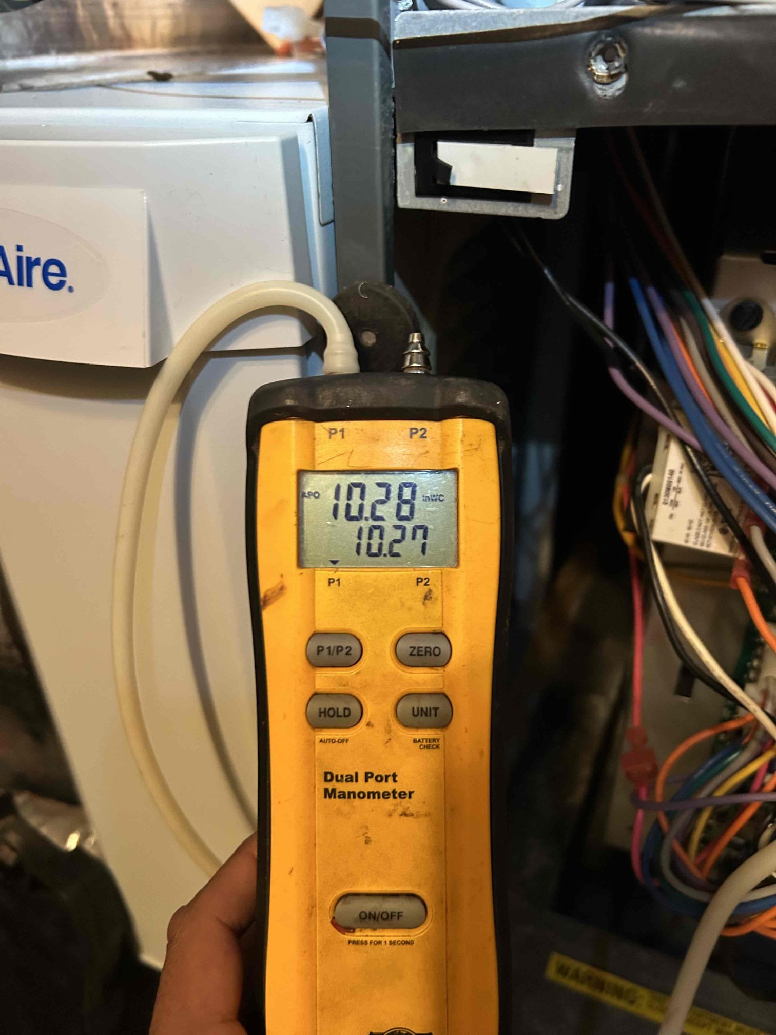 On October 15, I installed a propane safety low-pressure switch and replaced the igniter. I then installed a new Aprilaire Model 620A Humidifier, sealing it on the supply or return plenum. I ran a new bypass duct and connected it, installed a new copper water line, and connected it to the humidifier. I also installed a new control valve and a new humidistat, completing all necessary wiring. I ran a new drain line and connected it to the existing drain. After installation, I tested the humidifier and ensured it was operating correctly. I removed the old air cleaner and installed a new 413 filter air cleaner, adapting it to the existing ductwork. I also installed a surge protector for the blower motor and a water sensor. After repairs, I tested the system, cycling the heater and ensuring the humidifier was functioning properly. I set the system to winter mode at 35%. Gas pressure tests were within safe limits, and the CO test was within the safe range. The water sensor was also tested an