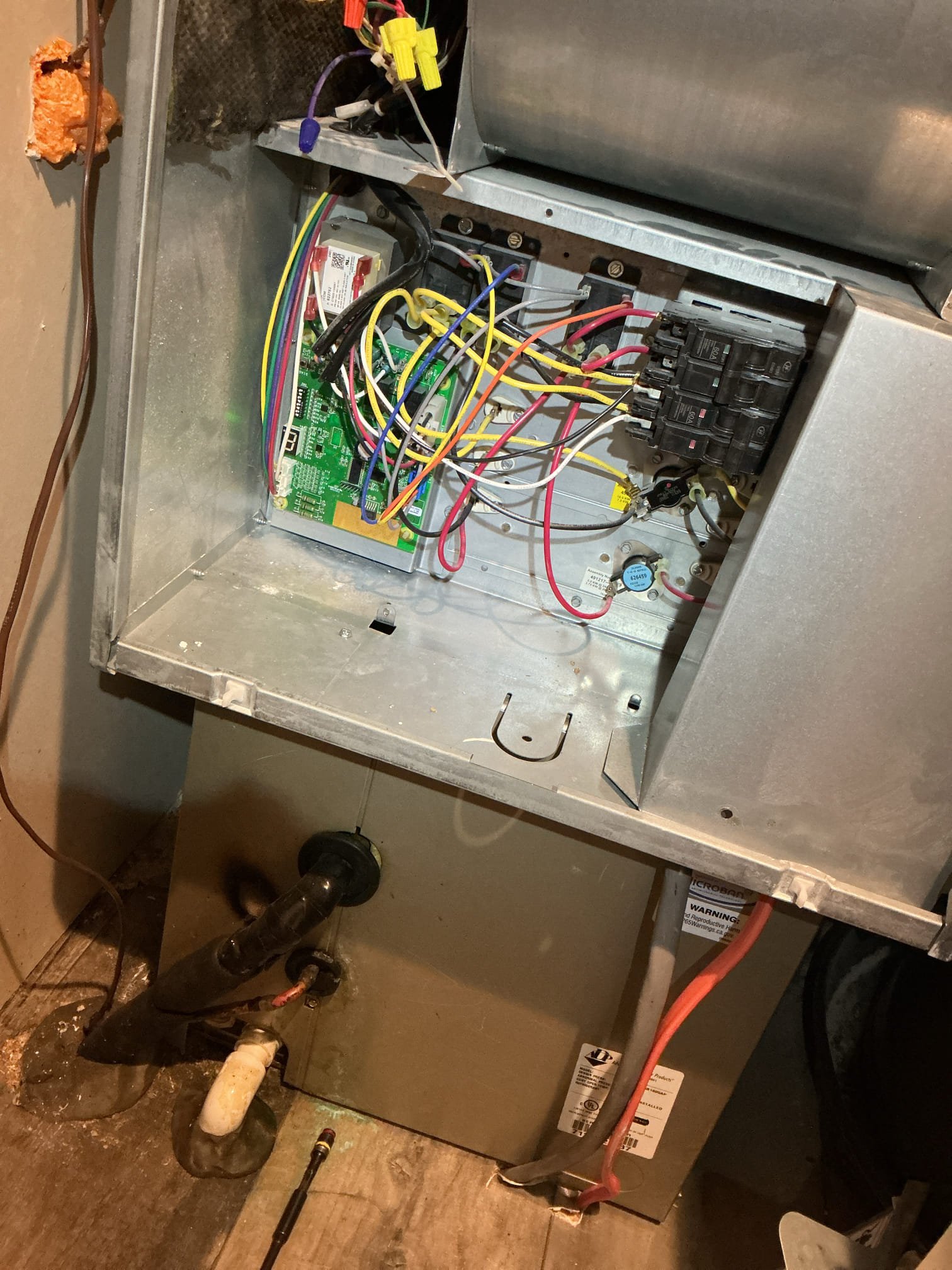 I inspected a 2-year-old Payne heat pump in a mobile home, checking system operation and confirming the 10 kW electric heater was functioning. I replaced the 16x20x1 filter and verified the blower speed at 1150 cfm, suitable for 3-ton cooling. Electrical components and vents were inspected, and the outside heat pump was checked. High pressures in the heat mode indicated restricted refrigerant flow, possibly due to ductwork issues or a meter device problem. I advised the customer to have the ductwork checked and properly sized.