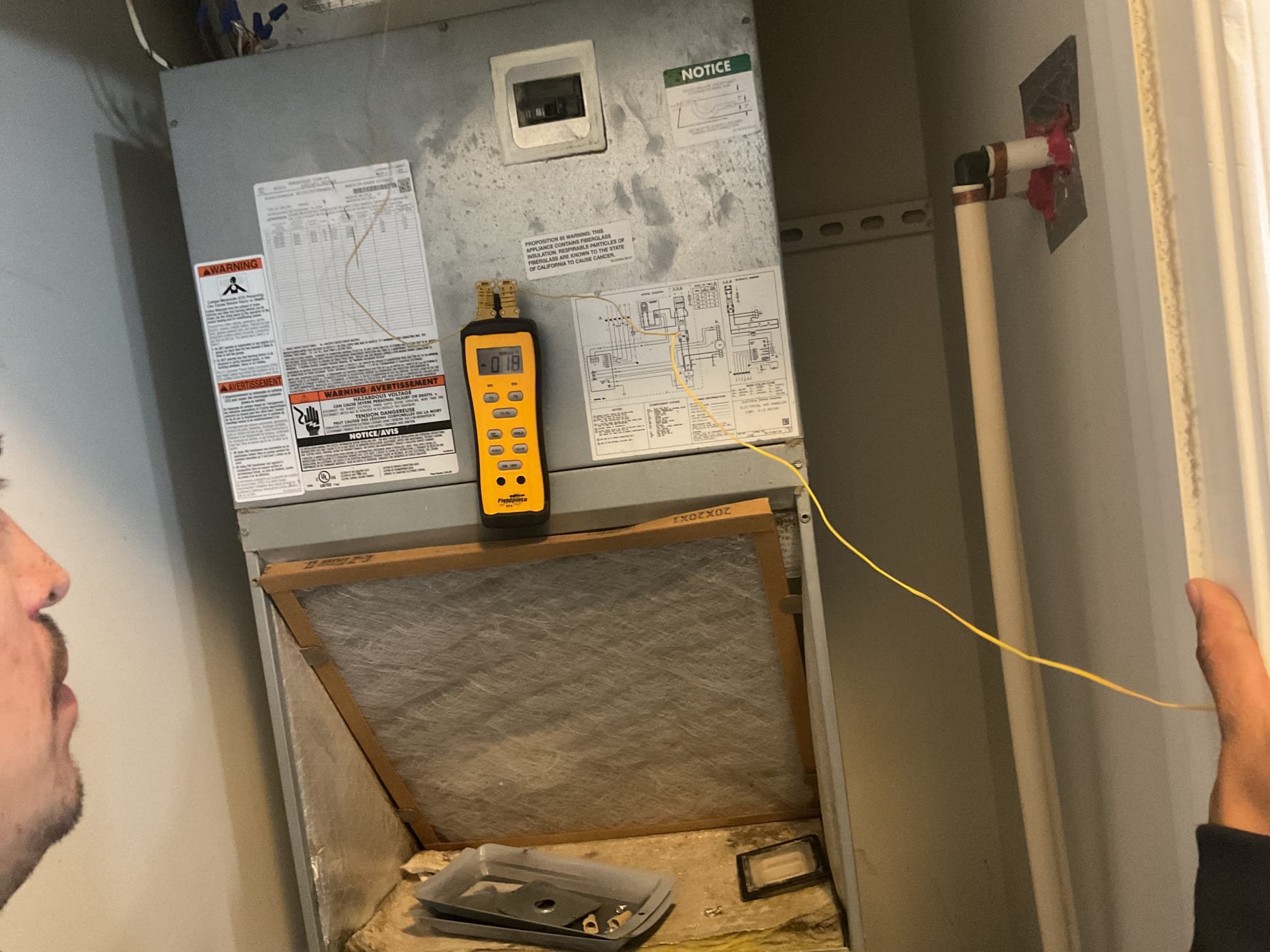 On October 16, I began by pulling the refrigerant charge back into the system. I then replaced the filter dryer and the indoor thermal expansion valve (TXV). After ensuring the system was properly sealed, I conducted a pressure test using 300 psi nitrogen and soap solution. The system was then vacuumed down to 470 microns. Following this, I released the charge and added 10 ounces of 410A refrigerant provided by the customer. The R410A pressures were recorded at 250/115 with 6 degrees of subcooling and 12 degrees of superheat. The temperature split was checked and found to be 18 degrees. The air conditioning system is now functioning properly.