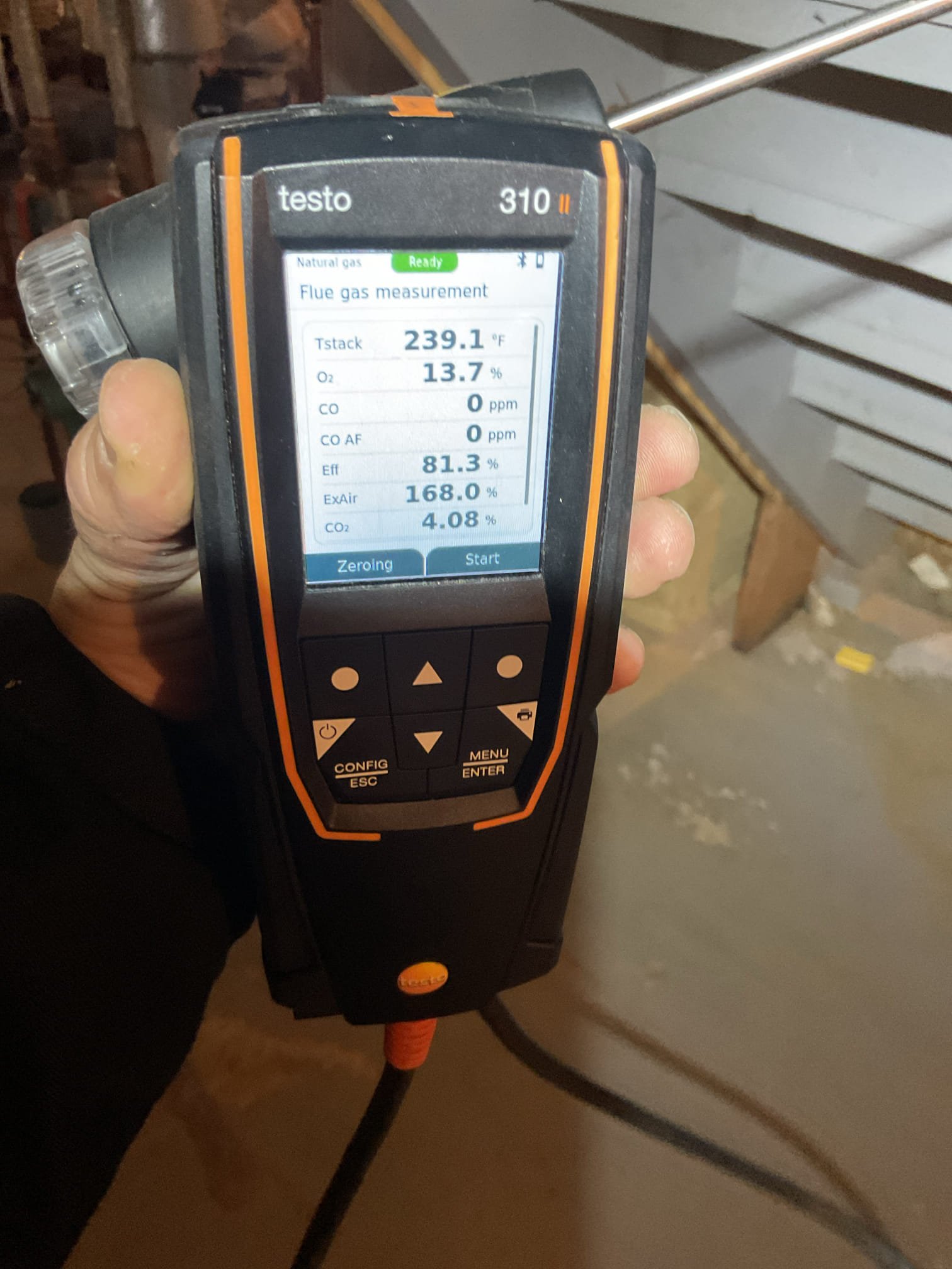 Upon inspection, the gas boiler was found to be non-functional, despite its major components being replaced in 2021 following a flood. The root cause was identified as a failed thermocouple. Initially, I attempted to clean and reinstall the existing thermocouple, but it still registered 0 mV AC. After discussing the issue with the homeowner, I replaced the thermocouple. Following the replacement, I allowed the boiler to run for five minutes and conducted a combustion test, which passed successfully. I also offered a plan membership and suggested the homeowner consider a new thermostat during the next tune-up, providing an email estimate for their review.