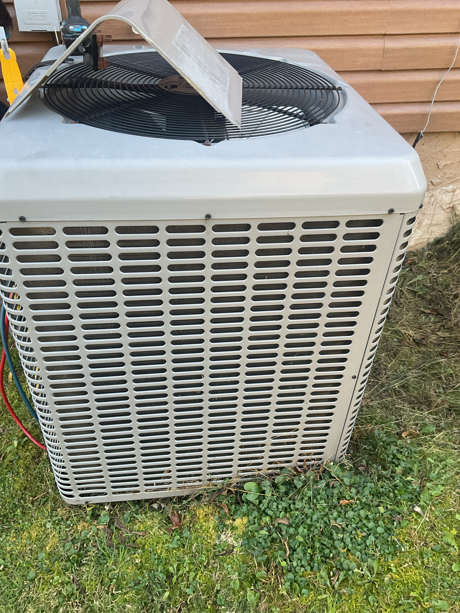 On 10/21/26, I conducted a comprehensive heat tune-up on a 2018 Coleman heat pump system. I began by replacing the 16x20x1 air filter to ensure optimal airflow. Next, I meticulously checked all electrical connections and components to verify their integrity and functionality. I tested the emergency heat feature to confirm it was operational. Additionally, I measured refrigerant pressures and temperatures to ensure they were within the manufacturer's specifications. Capacitors were tested for proper functionality. During the inspection, I discovered the absence of a trap on the condensation line, which I recommended to be replaced with an EZ Trap for efficient drainage. The heat pump system was fully operational at the time of service.
