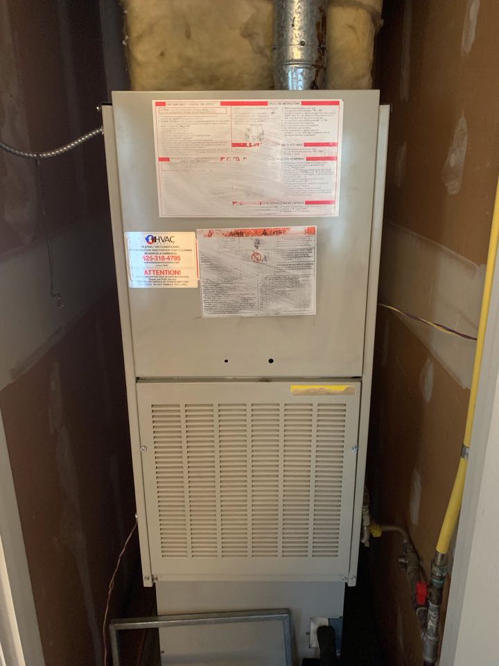 In Walnut Creek, California this afternoon performing a furnace maintenance for the Crane residence.