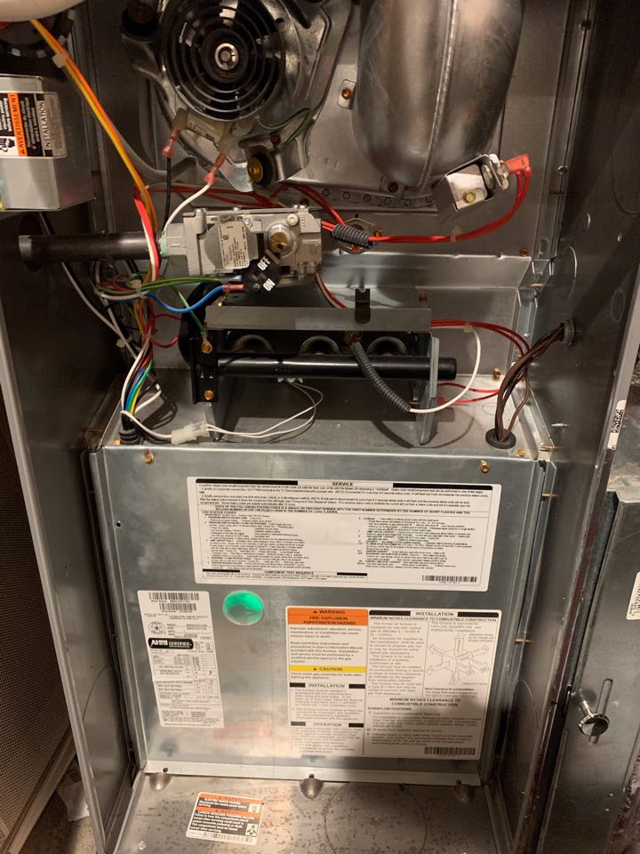 In Berkeley, California this afternoon performing a furnace maintenance for the Fleisher residence.