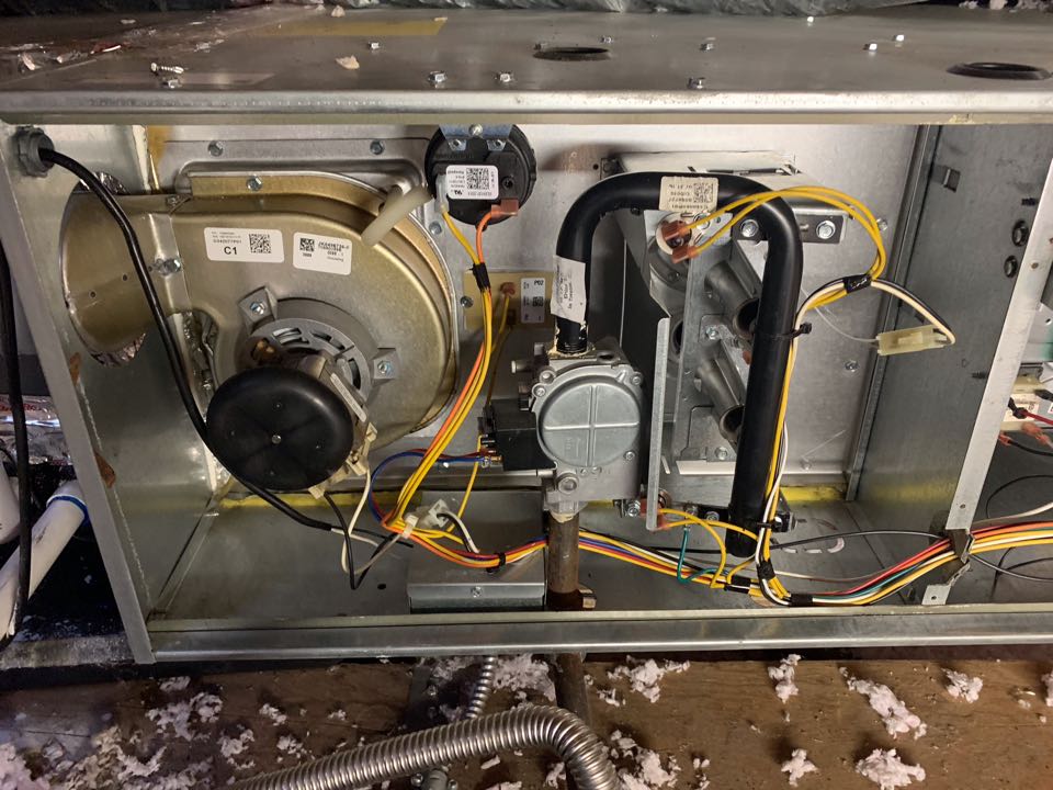 In Oakland, California this afternoon performing a furnace maintenance for the Clayton residence.