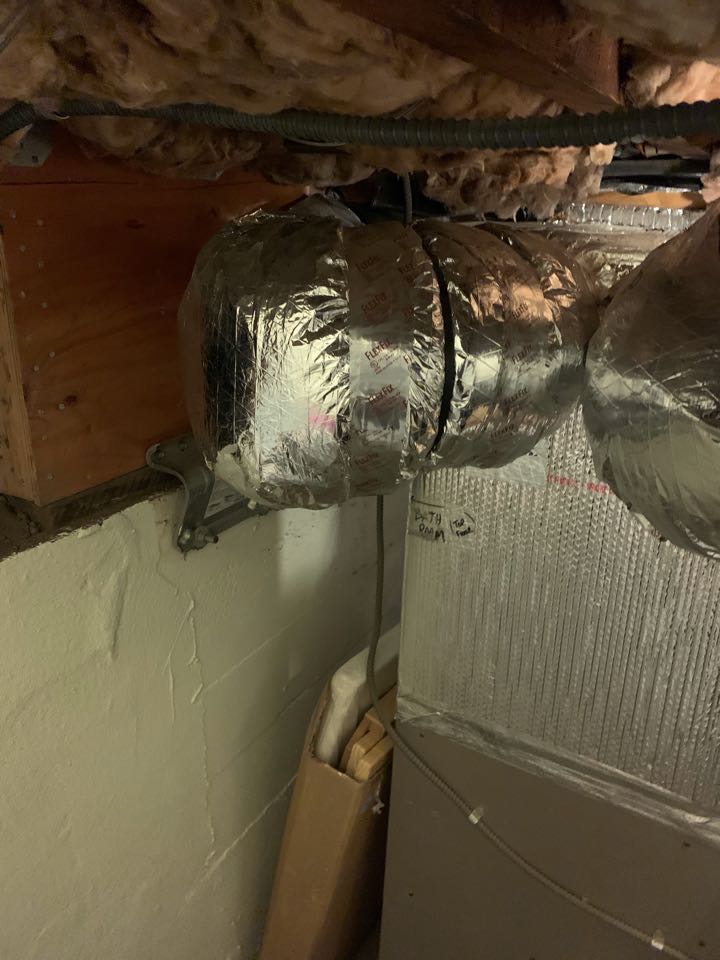 In Berkeley hill, California this afternoon performing a duct repair for the Wilstein residence.