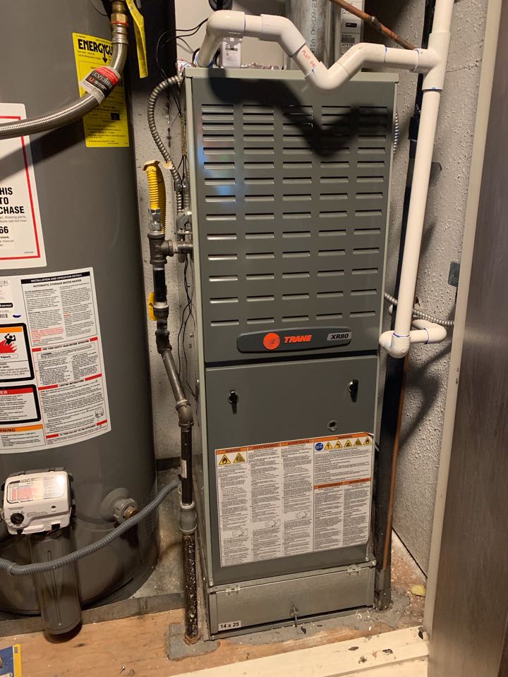 In Concord, California this afternoon performing a furnace maintenance for the Gerber residence.